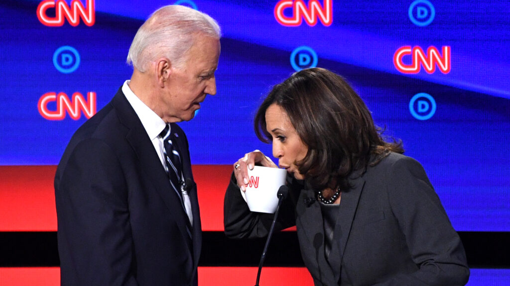 Democratic presidential hopefuls Former Vice President Joe Biden (L) and US Senator from California Kamala Harris chat during a break in the second round of the second Democratic primary debate of the 2020 presidential campaign season hosted by CNN at the Fox Theatre in Detroit, Michigan on July 31, 2019.