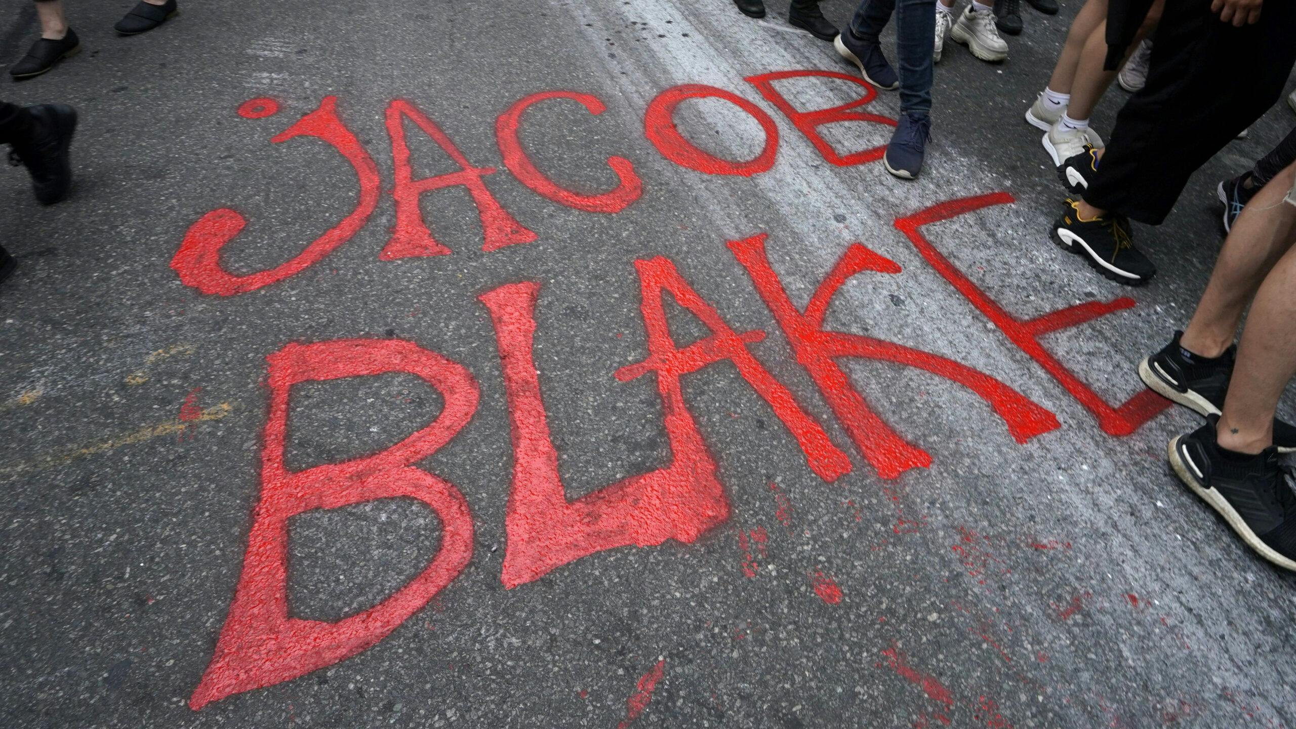 Demonstrators march through the city during a protest in New York August 24, 2020 against the shooting of Jacob Blake who shot in the back multiple times by police in Kenosha, Wisconsin, on Sunday, prompting community protests. - A video showing Wisconsin police shooting a black man in the back in front of his children sparked outrage across the United States on Monday, with officials calling in the national guard as they girded for a second night of violent protests.