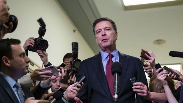 James Comey, former director of the Federal Bureau of Investigation (FBI), speaks to members of the media after testifying before the House Judiciary and House Oversight and Government Reform Committees joint investigation in Washington, D.C., U.S., on Friday, Dec. 7, 2018. Monday, January 20, 2020, marks the third anniversary of U.S. President Donald Trump's inauguration. Our editors select the best archive images looking back over Trump’s term in office. Photographer: Al Drago/Bloomberg