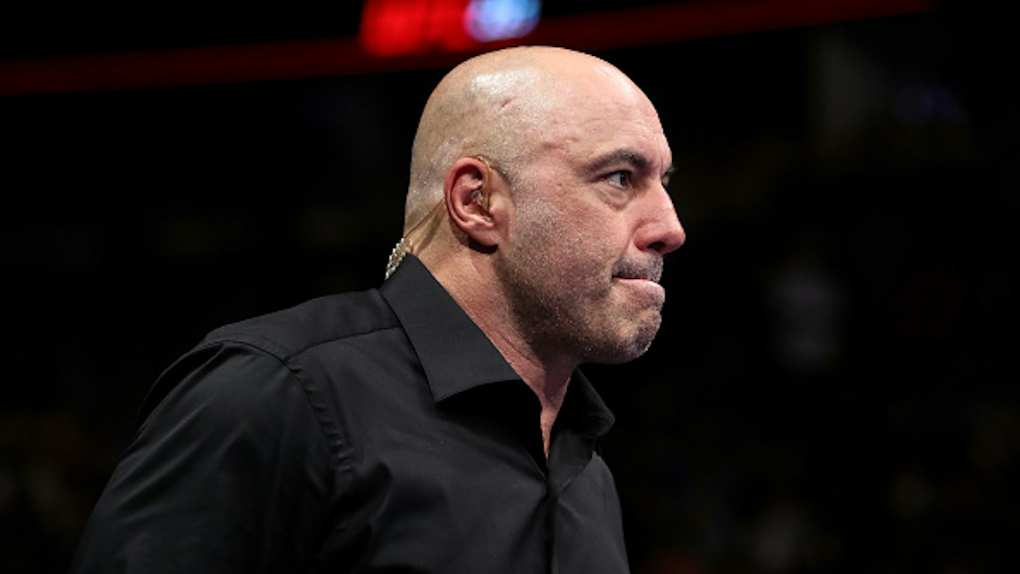 CHICAGO, IL - JUNE 09: Joe Rogan enters the octagon during the UFC 225: Whittaker v Romero 2 event at the United Center on June 9, 2018 in Chicago, Illinois.