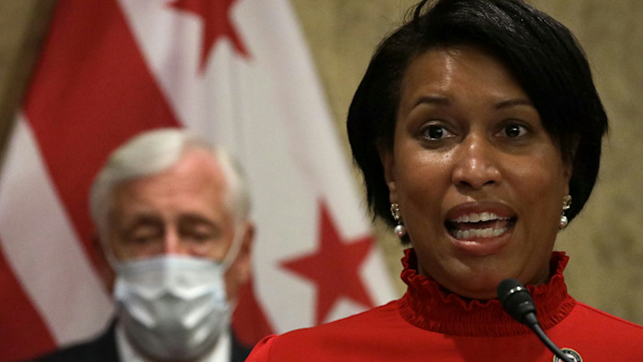 WASHINGTON, DC - JUNE 25: DC Mayor Muriel Bowser speaks as U.S. House Majority Leader Rep. Steny Hoyer (D-MD) listens during a news conference on District of Columbia statehood June 25, 2020 on Capitol Hill in Washington, DC. The House is scheduled to vote on the District of Columbia statehood bill tomorrow.