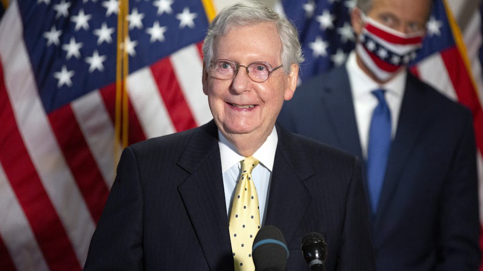 Lawmakers On Capitol Hill Begin Work On Next Phase Of Stimulus Plan Senate Majority Leader Mitch McConnell, a Republican from Kentucky, left, speaks during a news conference following the Senate Republican policy luncheon on Capitol Hill in Washington, D.C., U.S., on Tuesday, July 21, 2020. The White House and Congress have only a few weeks to come up with another stimulus to prevent the economic rout caused by the coronavirus from deepening as the outbreak is surging across the country.