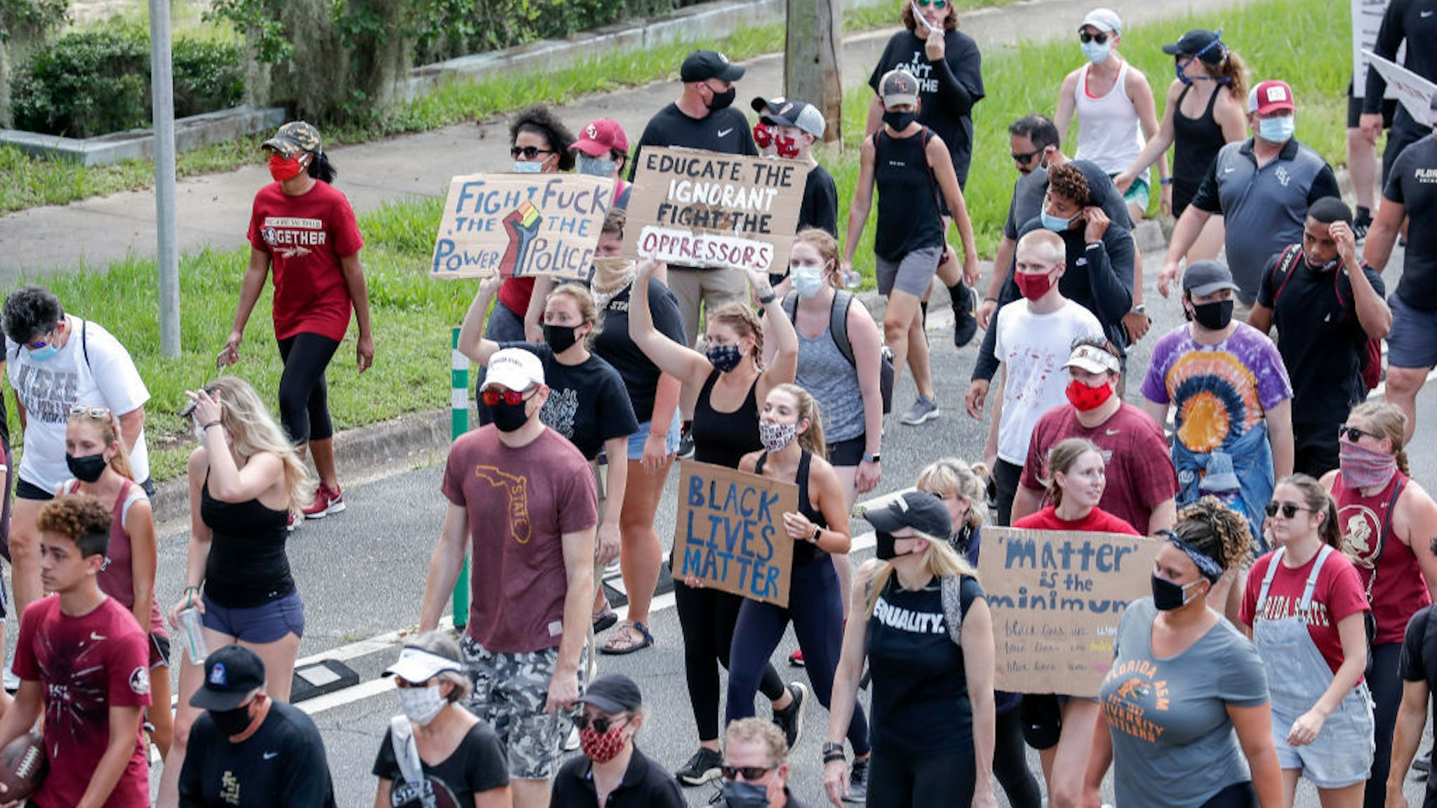TALLAHASSEE, FL - JUNE 13: The Florida State Football Team lead a large group of supporters during a player-led unity walk from Doak Campbell Stadium on the campus of Florida State University to the state capital building on June 13, 2020 in Tallahassee, Florida. (Photo by Don Juan Moore/Getty Images) *** Local Caption *** Florida State Football Team