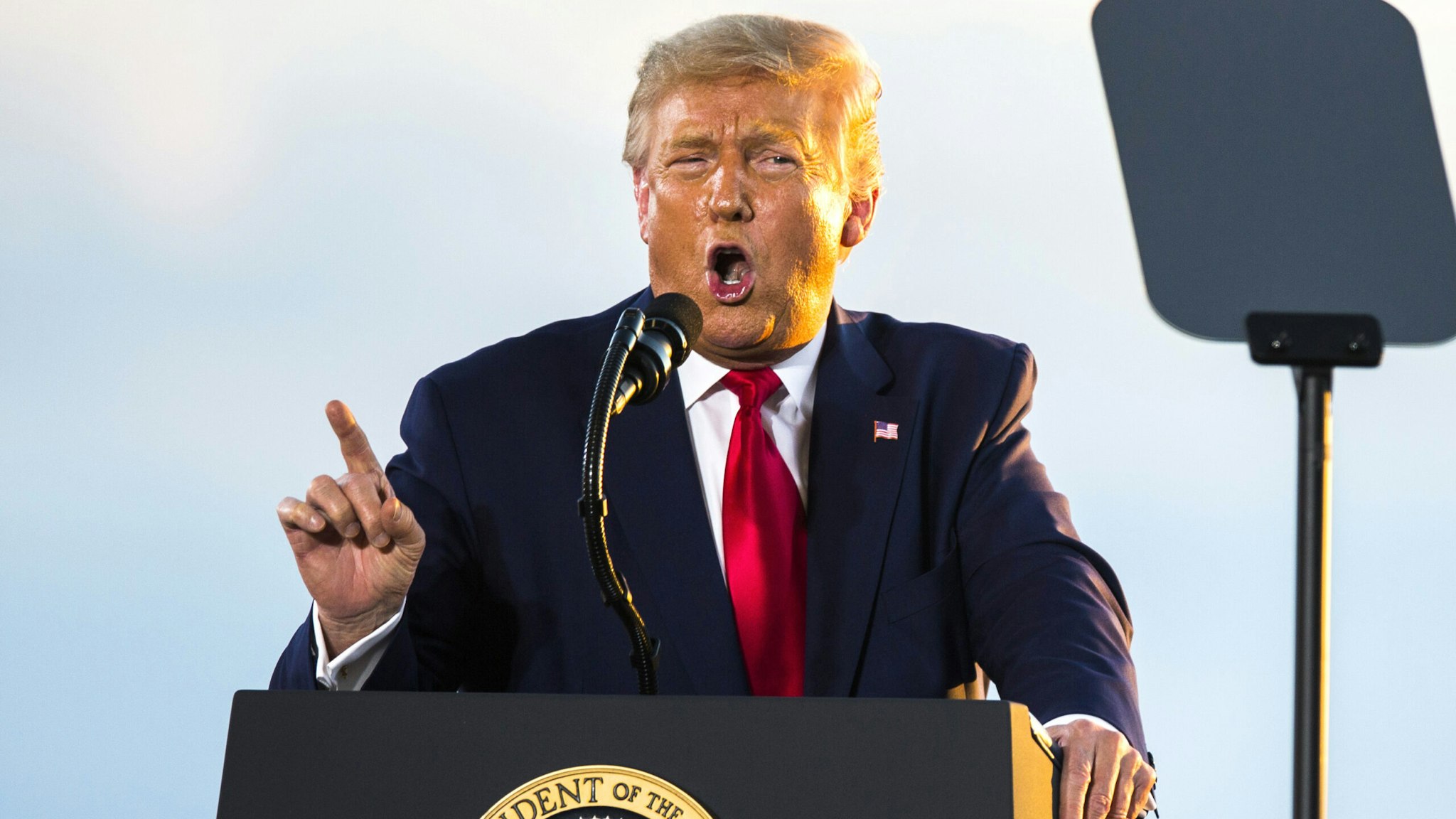 U.S. President Donald Trump speaks during a campaign rally at the Pro Star Aviation hangar in Londonderry, New Hampshire, U.S., on Friday, Aug. 28, 2020. Trump took aim at people protesting racism and police brutality, saying they are just looking for trouble and dont know about the killing of a Black man at the hands of police in Minneapolis that led to demonstrations nationally.