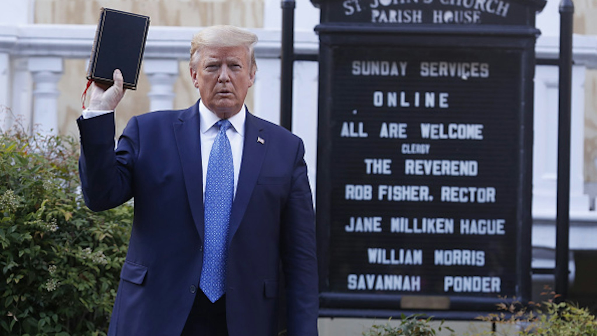 U.S. President Donald Trump poses with a bible outside St. John's Episcopal Church after a news conference in the Rose Garden of the White House in Washington, D.C., U.S., on Monday, June 1, 2020. Trump promised a forceful response to violent protests across the country before leaving the White House to visit a church across the street that had been been damaged by fires.