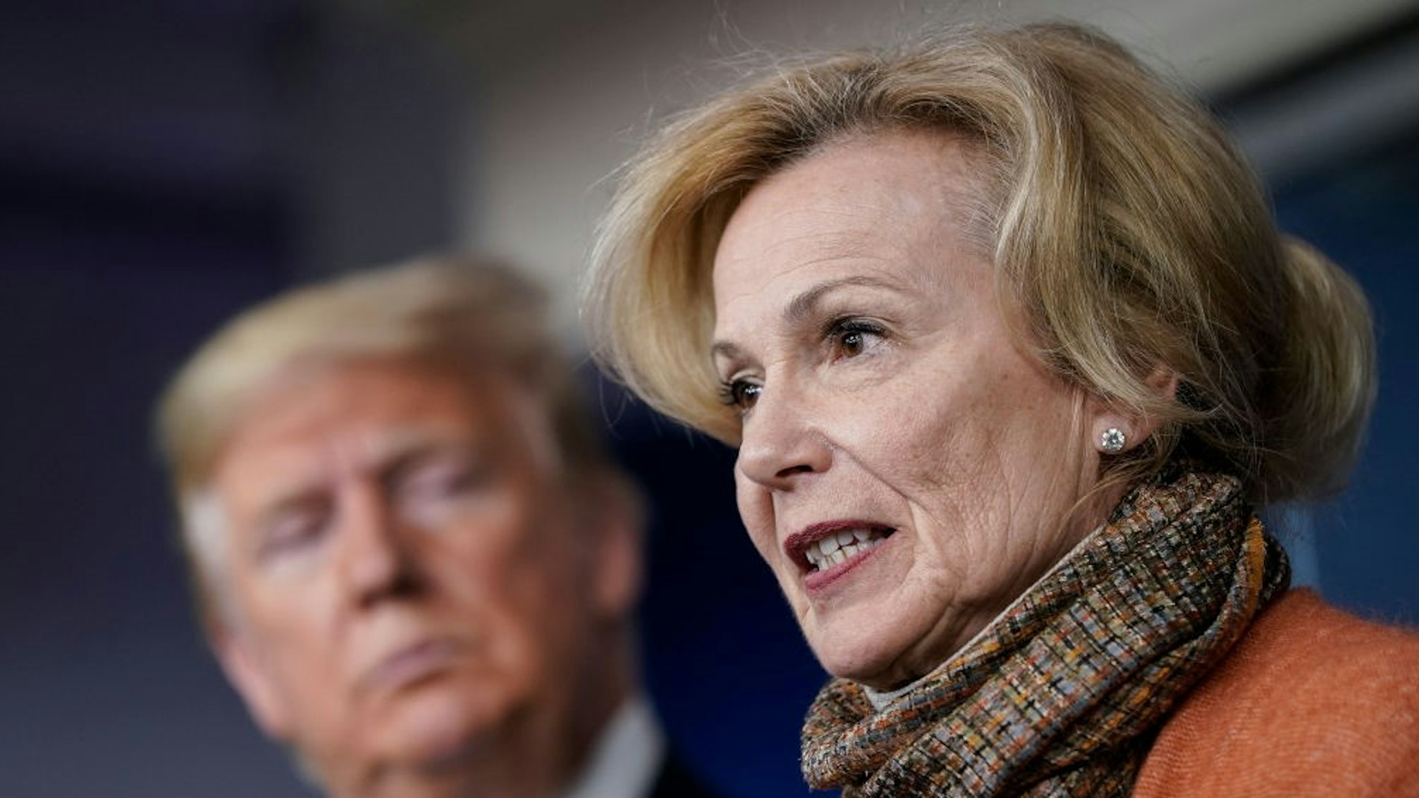WASHINGTON, DC - MARCH 17: (L-R) U.S. President Donald Trump looks on as White House Coronavirus Response Coordinator Dr. Deborah Birx speaks about the coronavirus outbreak in the press briefing room at the White House on March 17, 2020 in Washington, DC. The Trump administration is considering an $850 billion stimulus package to counter the economic fallout as the coronavirus spreads. (Photo by