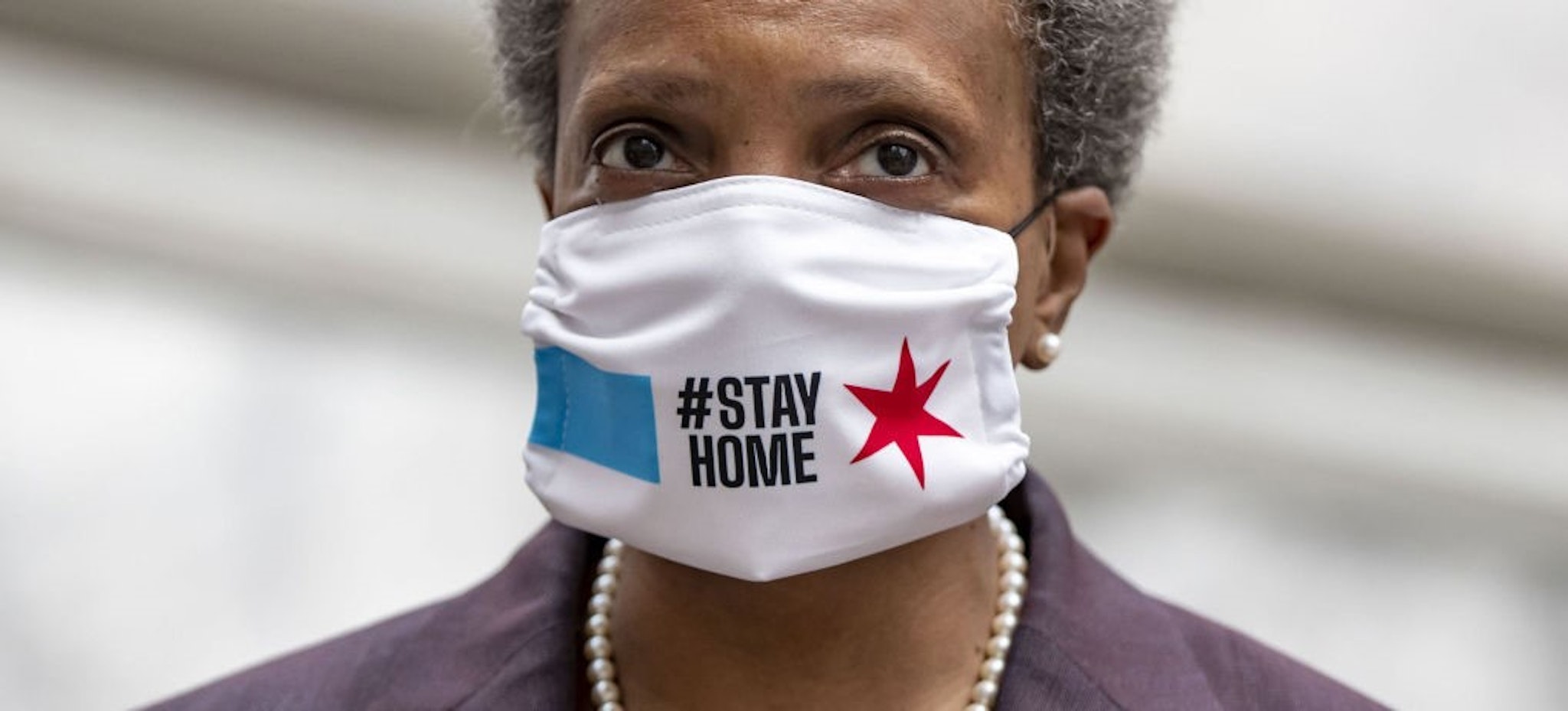 Chicago mayor Lori Lightfoot wears a mask as she prepares to speak about the city's coronavirus economic recovery plan on April 23, 2020.