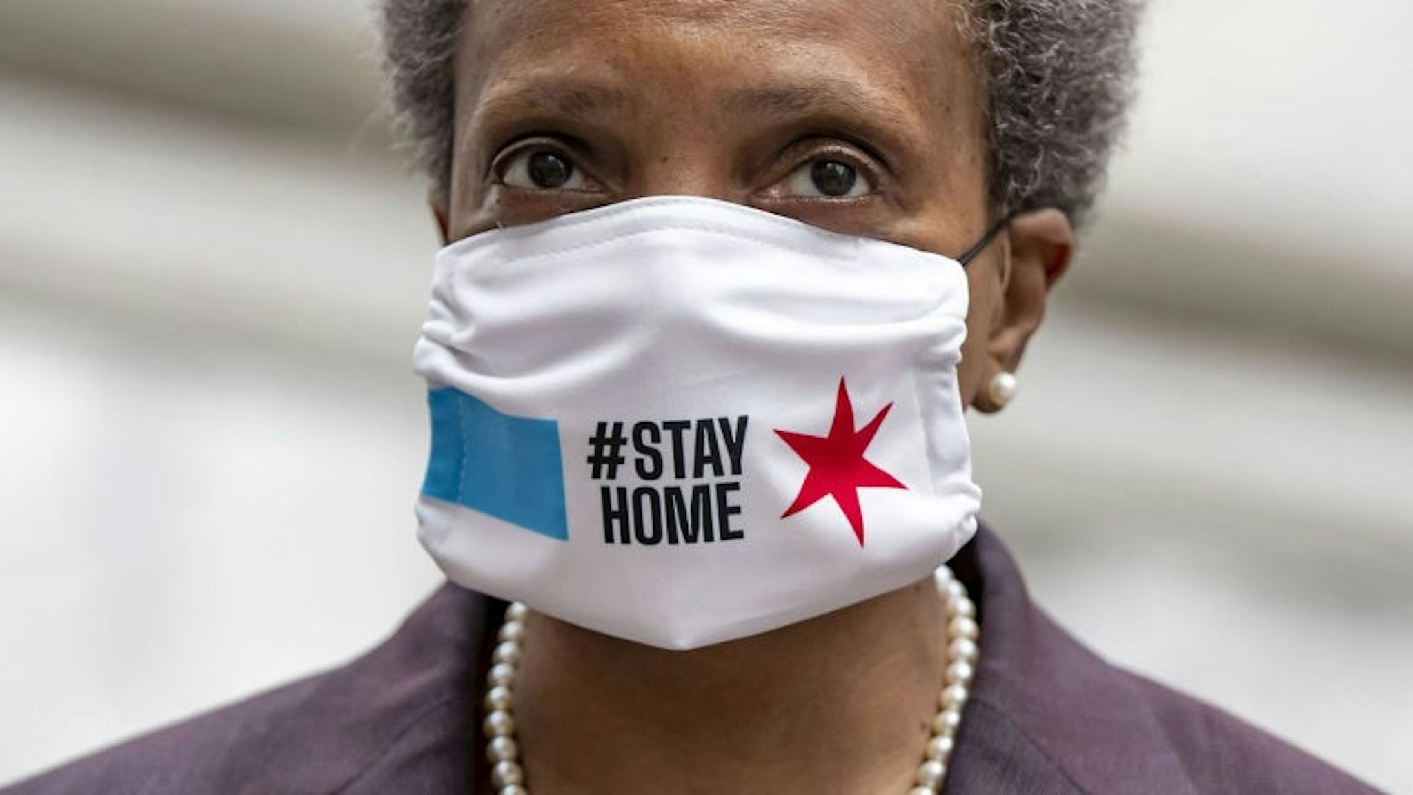 Chicago mayor Lori Lightfoot wears a mask as she prepares to speak about the city's coronavirus economic recovery plan on April 23, 2020.