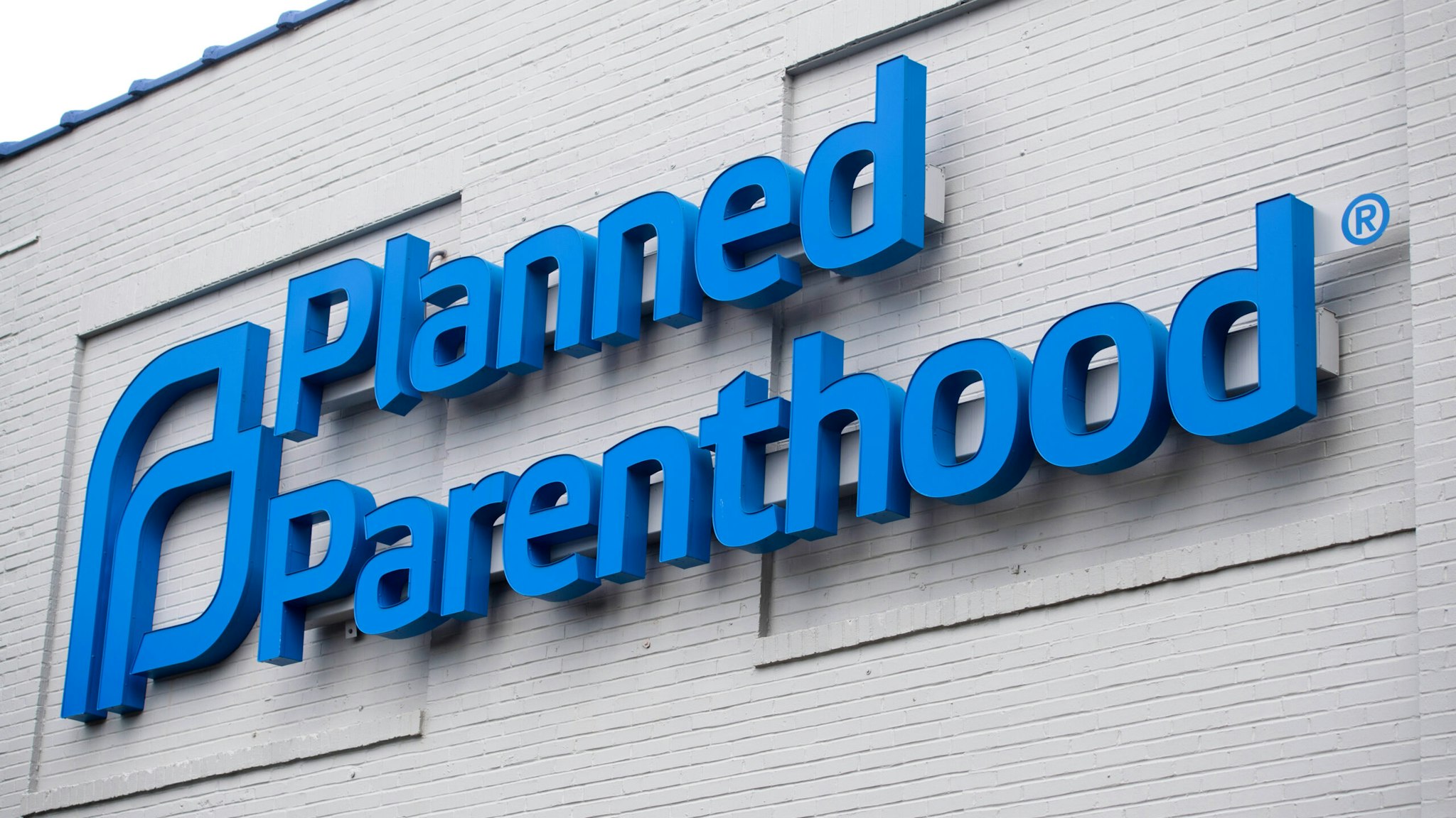 The logo of Planned Parenthood is seen outside the Planned Parenthood Reproductive Health Services Center in St. Louis, Missouri, May 30, 2019, the last location in the state performing abortions. - A US court weighed the fate of the last abortion clinic in Missouri on May 30, with the state hours away from becoming the first in 45 years to no longer offer the procedure amid a nationwide push to curtail access to abortion.