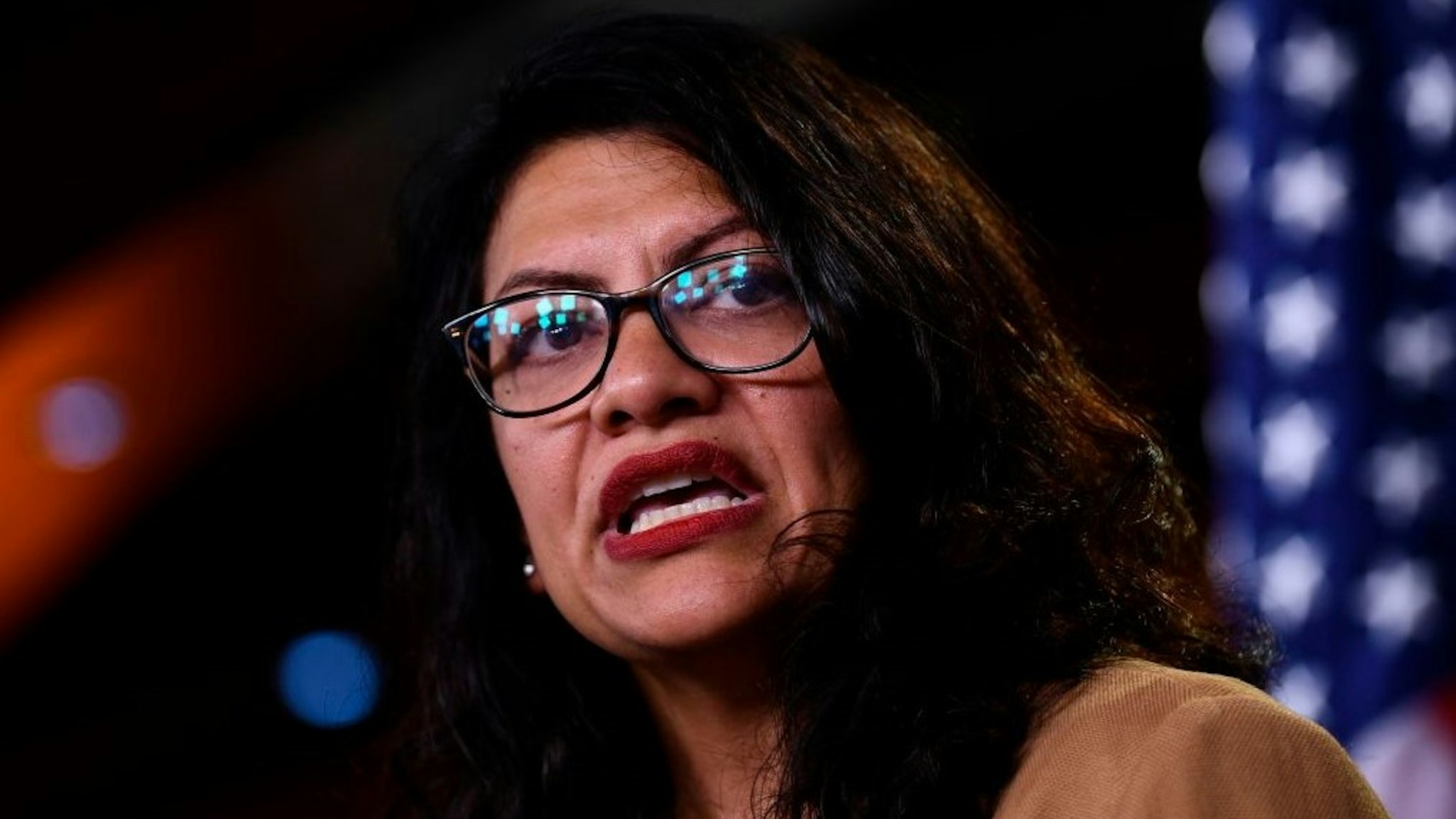US Representative Rashida Tlaib (D-MI) speaks during a press conference, to address remarks made by US President Donald Trump earlier in the day, at the US Capitol in Washington, DC on July 15, 2019. - President Donald Trump stepped up his attacks on four progressive Democratic congresswomen, saying if they're not happy in the United States "they can leave." (Photo by Brendan Smialowski / AFP) (Photo credit should read