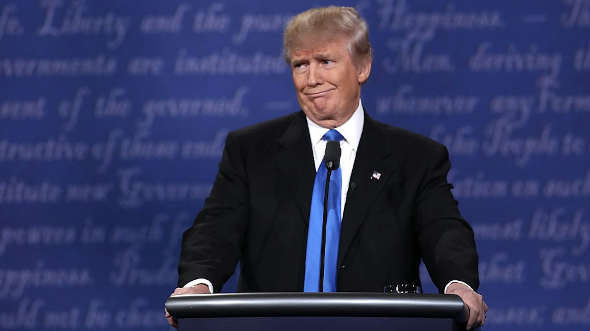 HEMPSTEAD, NY - SEPTEMBER 26: Republican presidential nominee Donald Trump makes a face during the Presidential Debate at Hofstra University on September 26, 2016 in Hempstead, New York. The first of four debates for the 2016 Election, three Presidential and one Vice Presidential, is moderated by NBC's Lester Holt. (Photo by