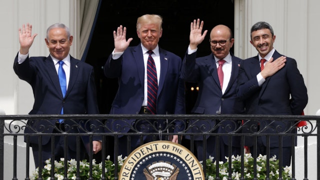 Prime Minister of Israel Benjamin Netanyahu, U.S. President Donald Trump, Foreign Affairs Minister of Bahrain Abdullatif bin Rashid Al Zayani, and Foreign Affairs Minister of the United Arab Emirates Abdullah bin Zayed bin Sultan Al Nahyan wave from the Truman Balcony of the White House after the signing ceremony of the Abraham Accords on the South Lawn of the White House on September 15, 2020 in Washington, DC.