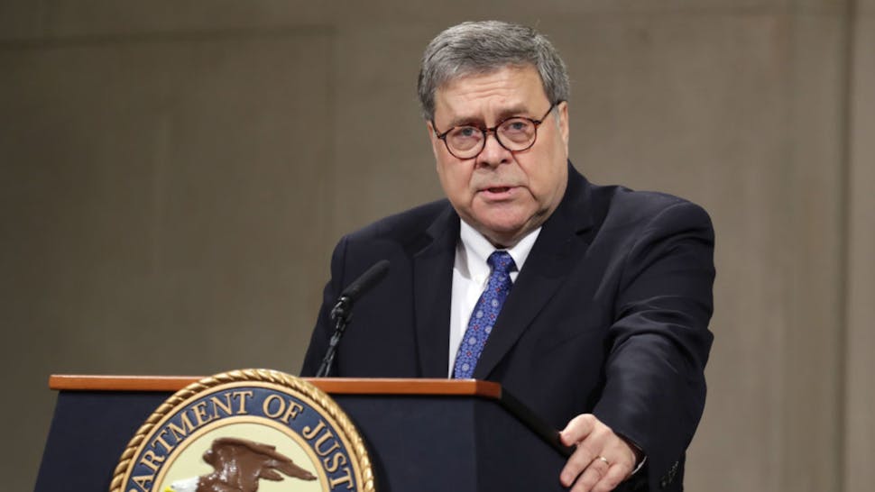 U.S. Attorney General William Barr delivers remarks during a farewell ceremony for Deputy Attorney General Rod Rosenstein at the Robert F. Kennedy Main Justice Building May 09, 2019 in Washington, DC.