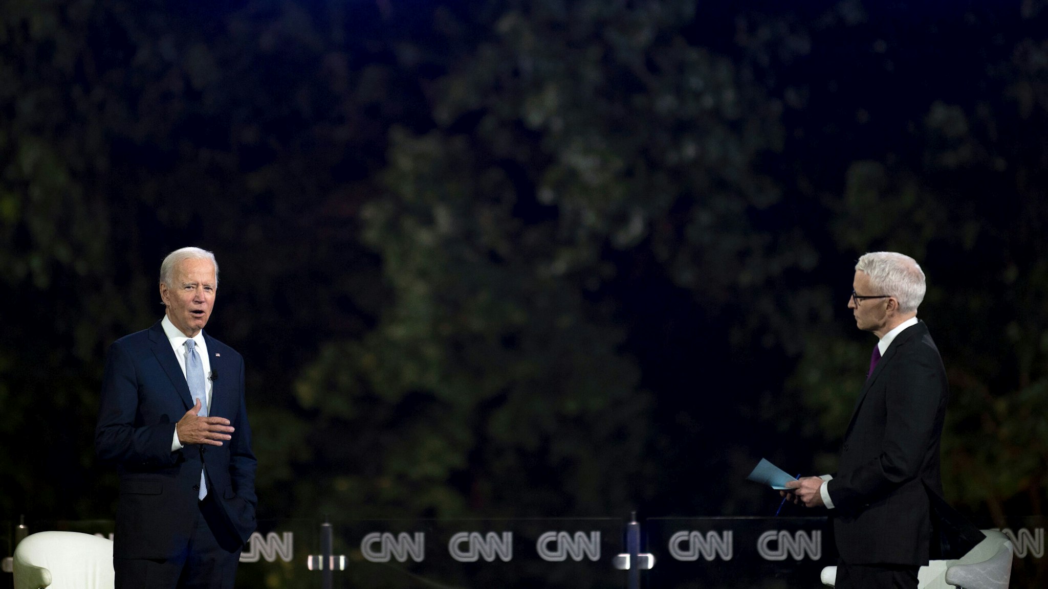 Democratic presidential candidate Joe Biden (L) speaks, alongside journalist Anderson Cooper, during a CNN drive-in Town Hall meeting in Scranton, Pennsylvania, on September 17, 2020.