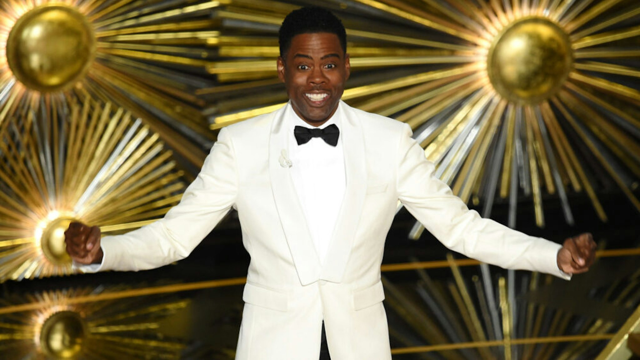 HOLLYWOOD, CA - FEBRUARY 28: Host Chris Rock speaks onstage during the 88th Annual Academy Awards at the Dolby Theatre on February 28, 2016 in Hollywood, California.