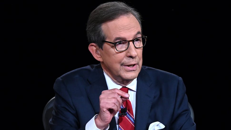 US-VOTE-DEBATE Debate moderator and Fox News anchor Chris Wallace directs the first presidential debate at Case Western Reserve University and Cleveland Clinic in Cleveland, Ohio, on September 29, 2020.
