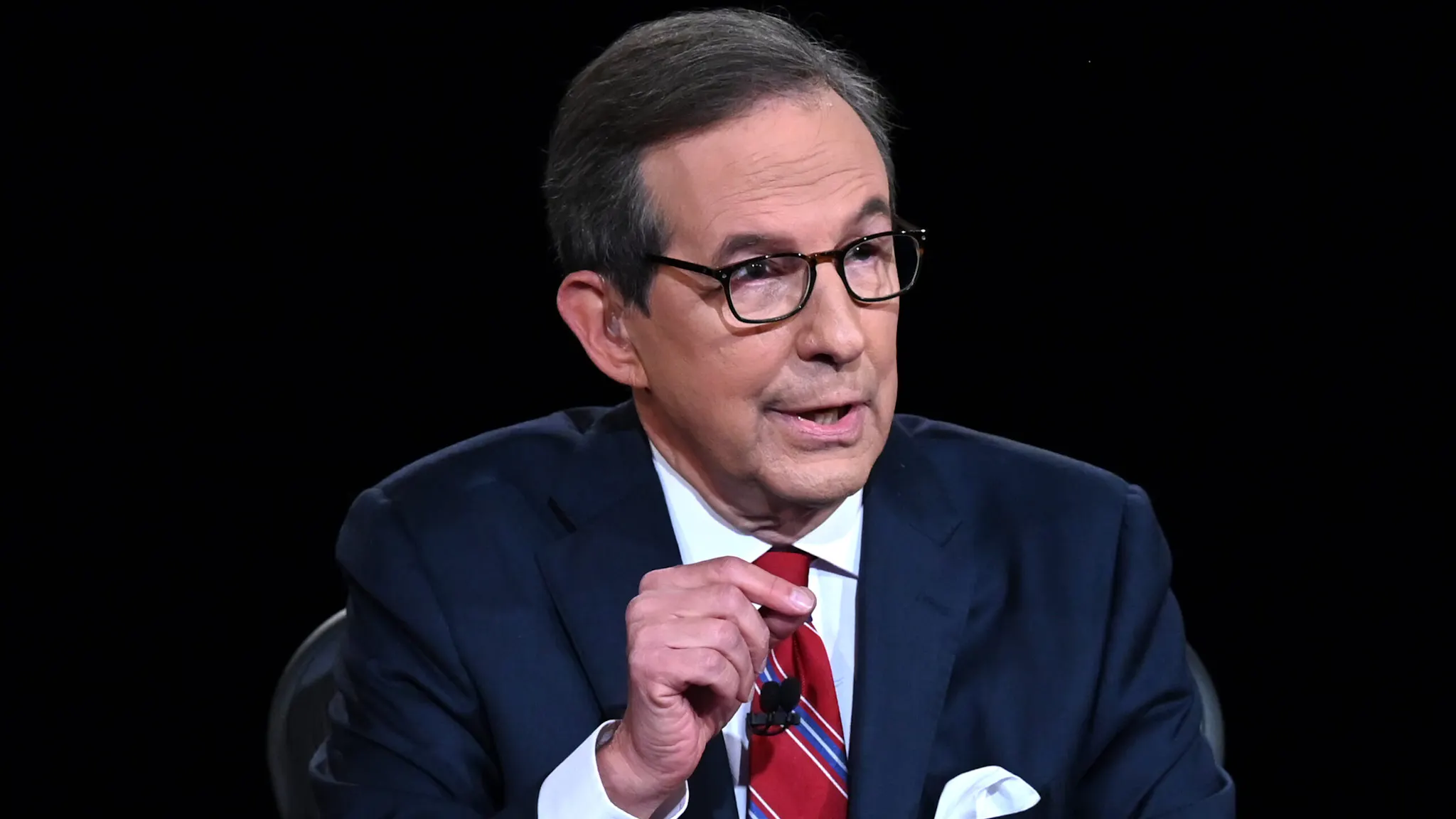 US-VOTE-DEBATE Debate moderator and Fox News anchor Chris Wallace directs the first presidential debate at Case Western Reserve University and Cleveland Clinic in Cleveland, Ohio, on September 29, 2020.