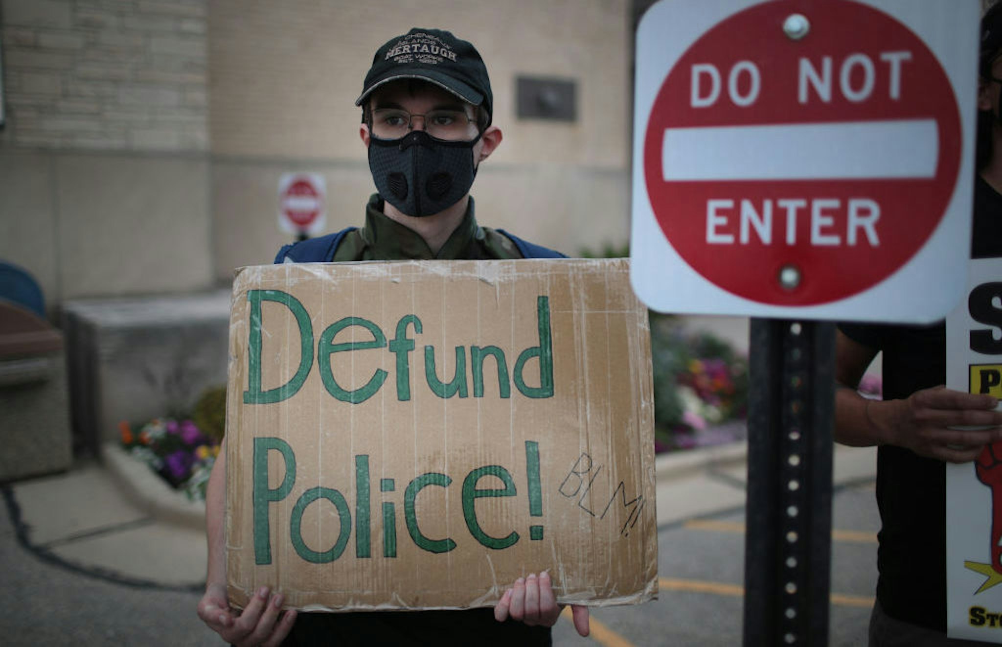 A small group of peaceful demonstrators protesting the shooting of Jacob Blake hold a rally on August 28, 2020 in Kenosha, Wisconsin. Blake was shot seven times in the back in front of his three children by a police officer. The shooting has led to several days of rioting and protests in the city. (Photo by Scott Olson/Getty Images)