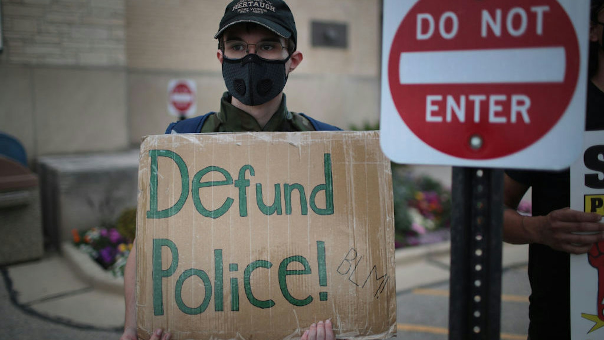 A small group of peaceful demonstrators protesting the shooting of Jacob Blake hold a rally on August 28, 2020 in Kenosha, Wisconsin. Blake was shot seven times in the back in front of his three children by a police officer. The shooting has led to several days of rioting and protests in the city. (Photo by Scott Olson/Getty Images)