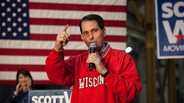 Governor Scott Walker (WI-R) speaks to supporters at a last minute get out the vote rally the night before the midterm elections at the Weldall Mfg., Inc. on November 5, 2018 in Waukesha, Wisconsin.