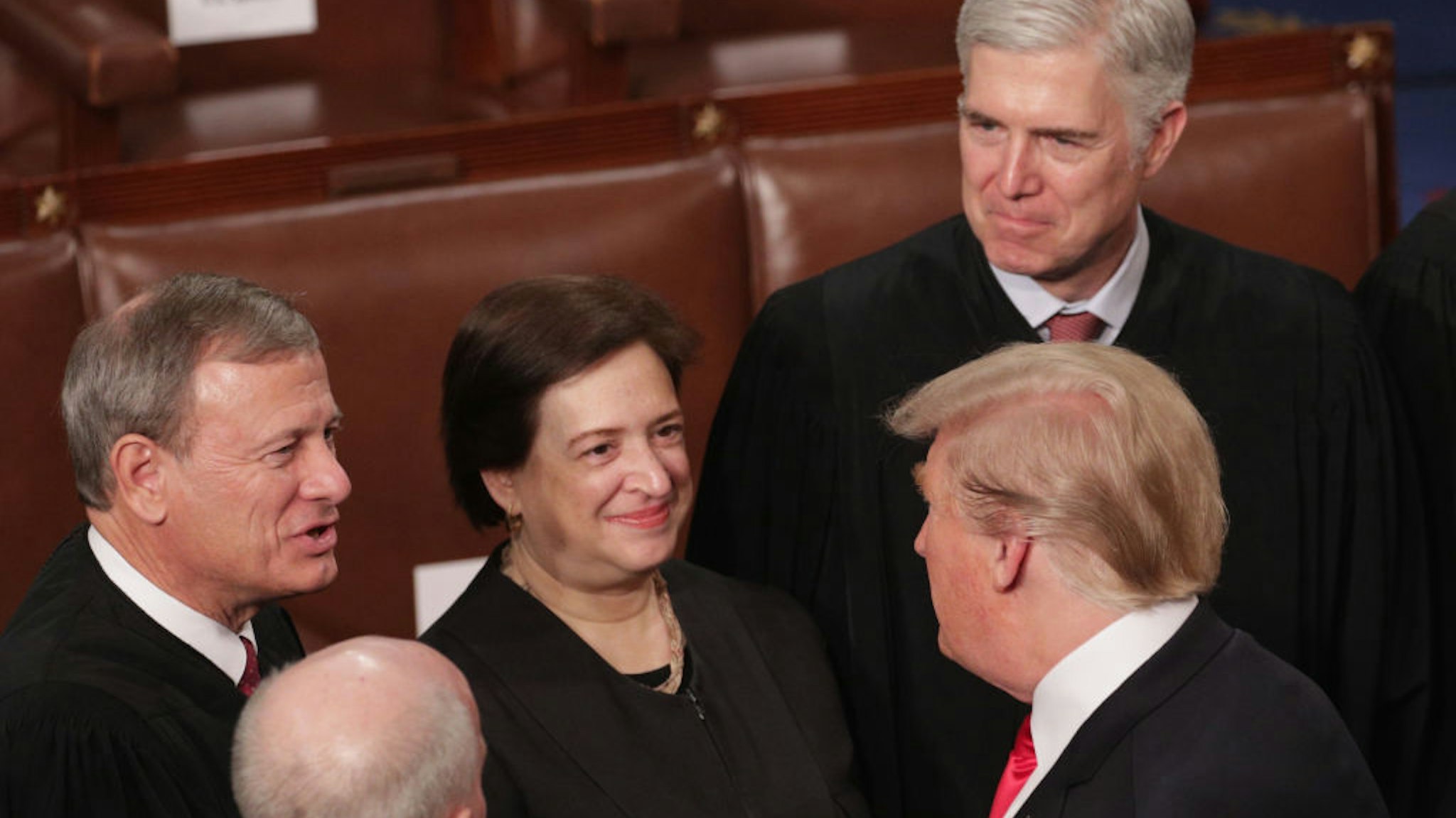 President Donald Trump greets Supreme Court Justices John Roberts, Elena Kagan, and Neil Gorsuch after the State of the Union address in the chamber of the U.S. House of Representatives at the U.S. Capitol Building on February 5, 2019 in Washington, DC.