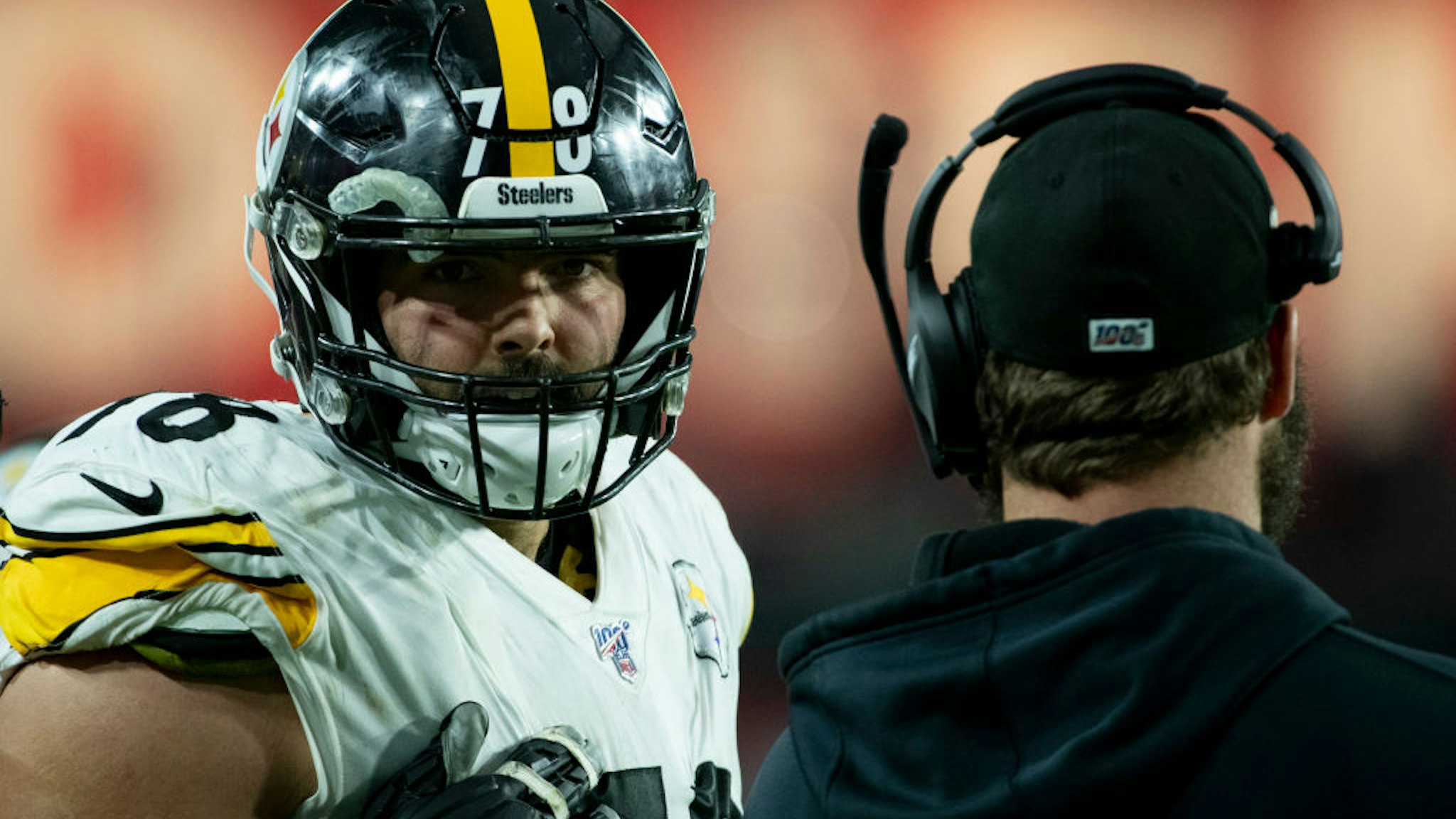 Offensive tackle Alejandro Villanueva #78 of the Pittsburgh Steelers talks with quarterback Ben Roethlisberger #7 on the sidelines of the game against the Arizona Cardinals at State Farm Stadium on December 08, 2019 in Glendale, Arizona.