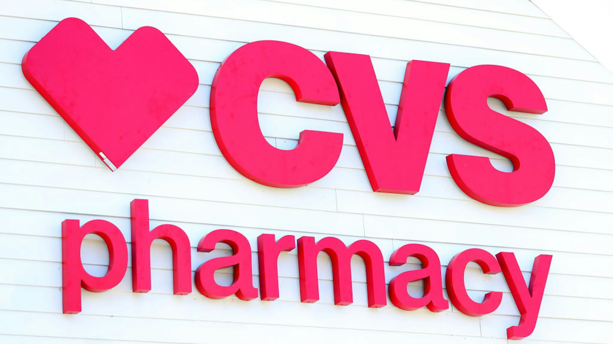A sign on the side of the CVS Pharmacy on May 15, 2020 in Carver, Massachusetts. Nine CVS locations began providing coronavirus tests in Massachusetts, issuing self swab tests to people by appointment.