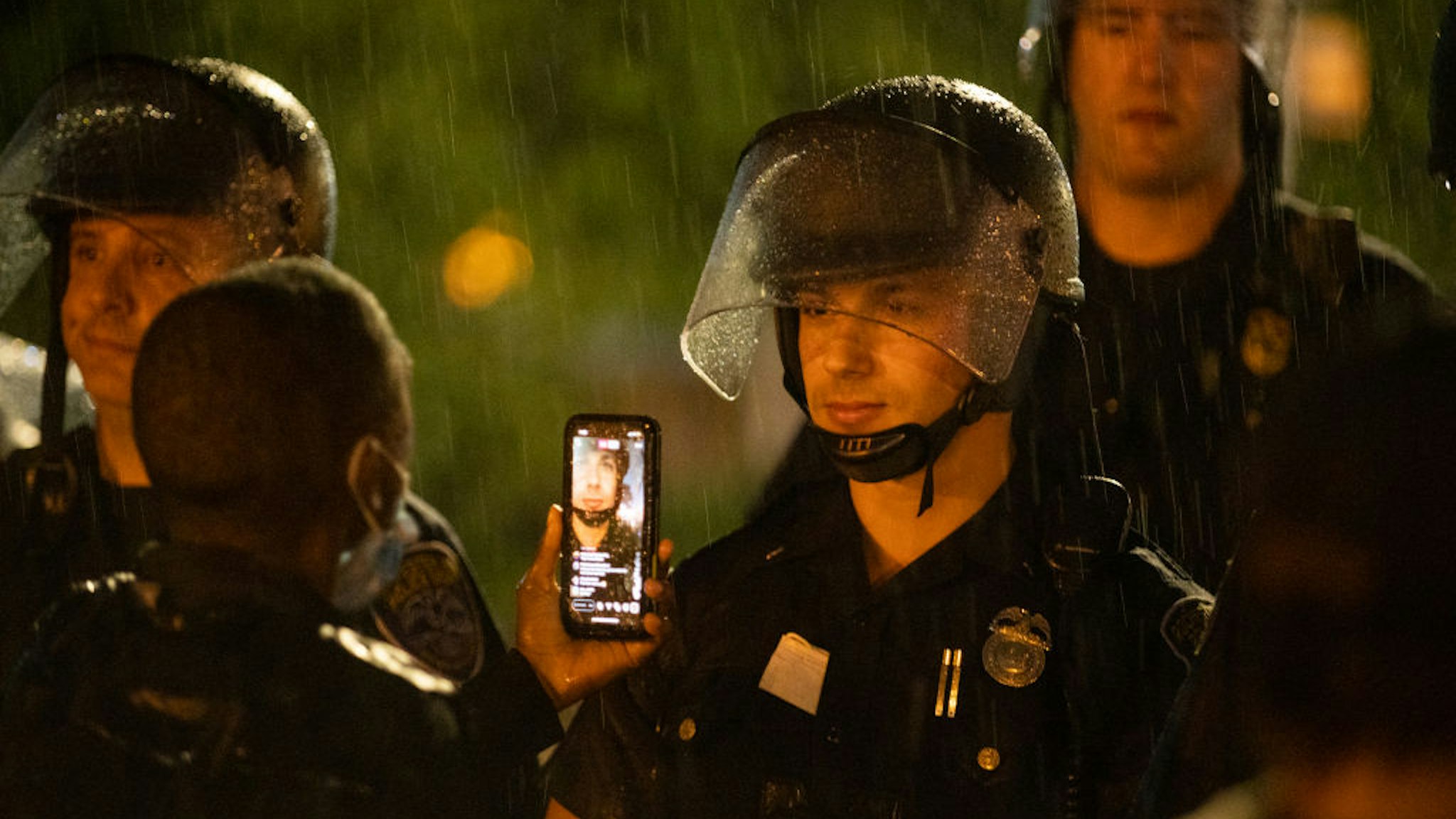 A police officer stands watch during a protest on September 03, 2020 in Rochester, New York. Daniel Prude died after being arrested on March 23, by Rochester police.