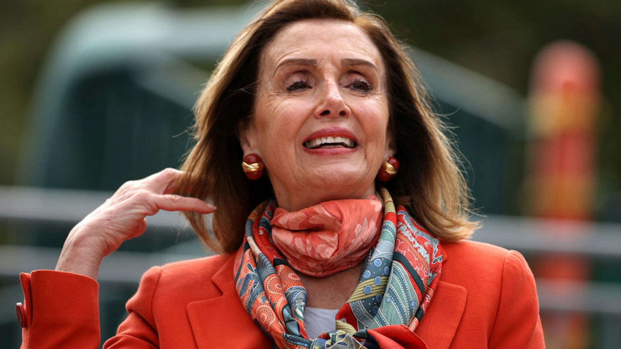 U.S. Speaker of the House Nancy Pelosi (D-CA) adjusts her hair as she speaks during a Day of Action For the Children event at Mission Education Center Elementary School on September 02, 2020 in San Francisco, California.