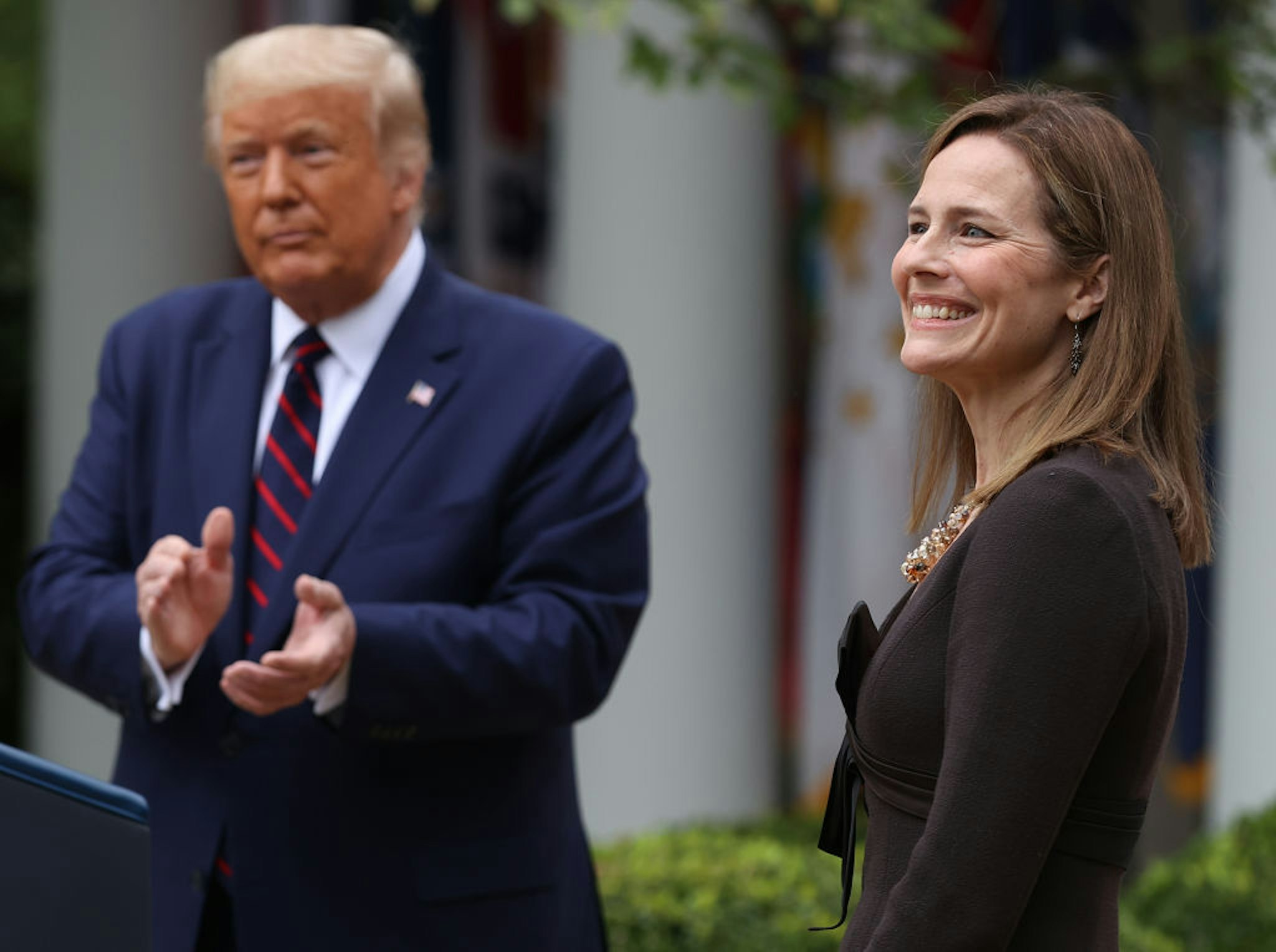 WASHINGTON, DC - SEPTEMBER 26: U.S. President Donald Trump (L) introduces 7th U.S. Circuit Court Judge Amy Coney Barrett as his nominee to the Supreme Court in the Rose Garden at the White House September 26, 2020 in Washington, DC. With 38 days until the election, Trump tapped Barrett to be his third Supreme Court nominee in just four years and to replace the late Associate Justice Ruth Bader Ginsburg, who will be buried at Arlington National Cemetery on Tuesday. (Photo by Chip Somodevilla/Getty Images) and authorities at his disposal, to aid U.S. farmers, whose financial peril has worsened in the coronavirus pandemic. Photographer:
