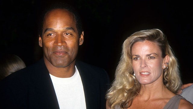 O.J. Simpson and Nicole Brown Simpson pose at the premiere of the "Naked Gun 33 1/3: The Final Isult" in which O.J. starred on March 16, 1994 in Los Angeles, California.
