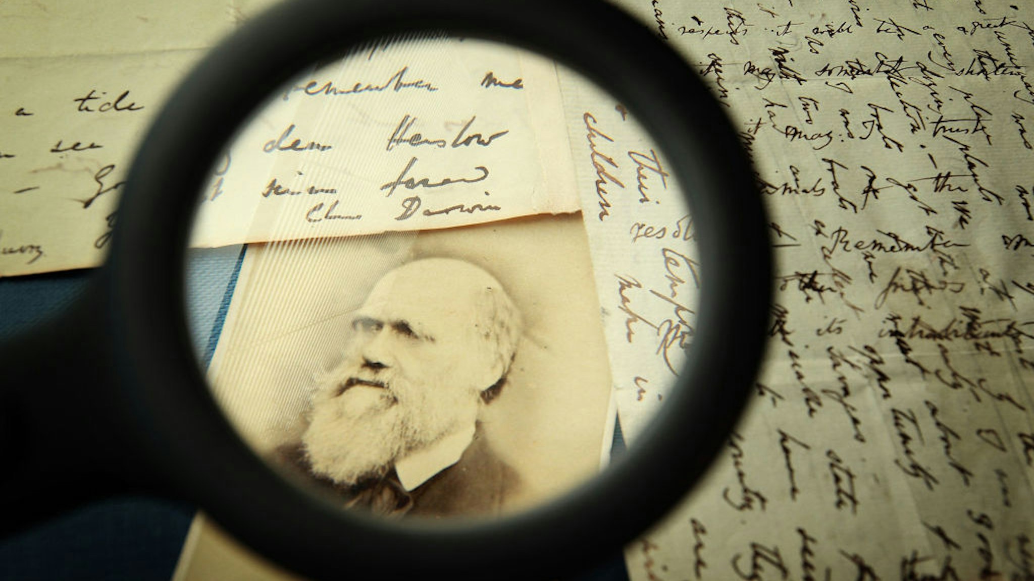 ONDON, ENGLAND - MARCH 25: Original letters from Charles Darwin are displayed at the Herbaruim library on March 25, 2009 at the Royal Botanic Gardens, Kew in London. Darwin wrote the letter (R) to his mentor Reverend John Henslow aboard HMS Beagle in April 1833 - writing two ways - as paper was expensive. (Photo by Peter Macdiarmid/Getty Images)