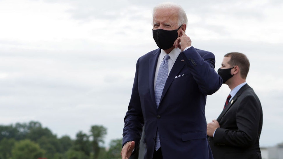 WEST MIFFLIN, PENNSYLVANIA - on August 31: Democratic presidential candidate former Vice President Joe Biden gestures after he landed at Allegheny County Airport on August 31, 2020 in West Mifflin, Pennsylvania. Biden is traveling to Pittsburgh today and will speak on the protests against racism and police violence in Kenosha, Wisconsin and Portland, Oregon. (Photo by Alex Wong/Getty Images)