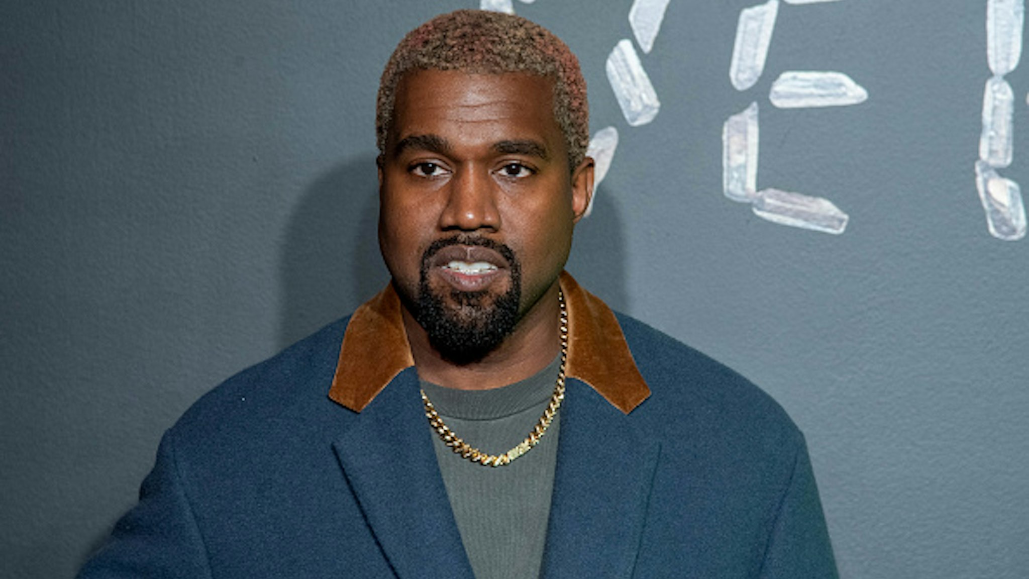 NEW YORK, NEW YORK - DECEMBER 02: Kanye West attends the the Versace fall 2019 fashion show at the American Stock Exchange Building in lower Manhattan on December 02, 2018 in New York City.