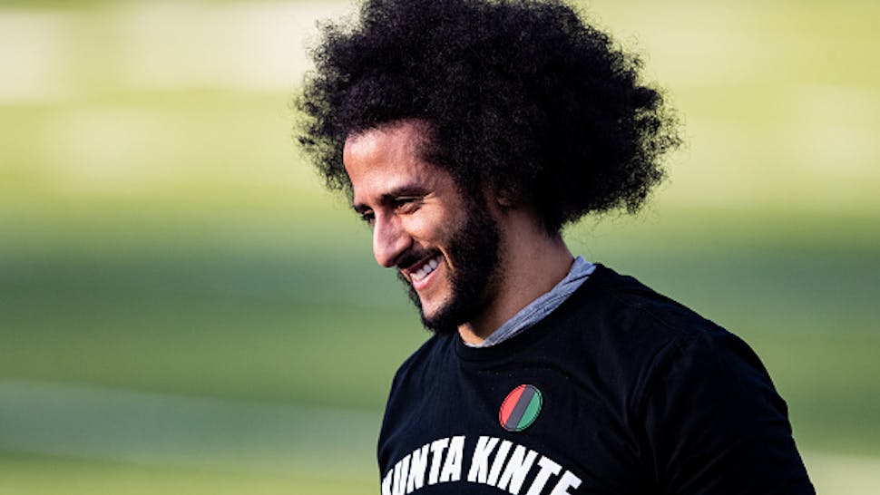 RIVERDALE, GA - NOVEMBER 16: Colin Kaepernick looks on during his NFL workout held at Charles R Drew high school on November 16, 2019 in Riverdale, Georgia.
