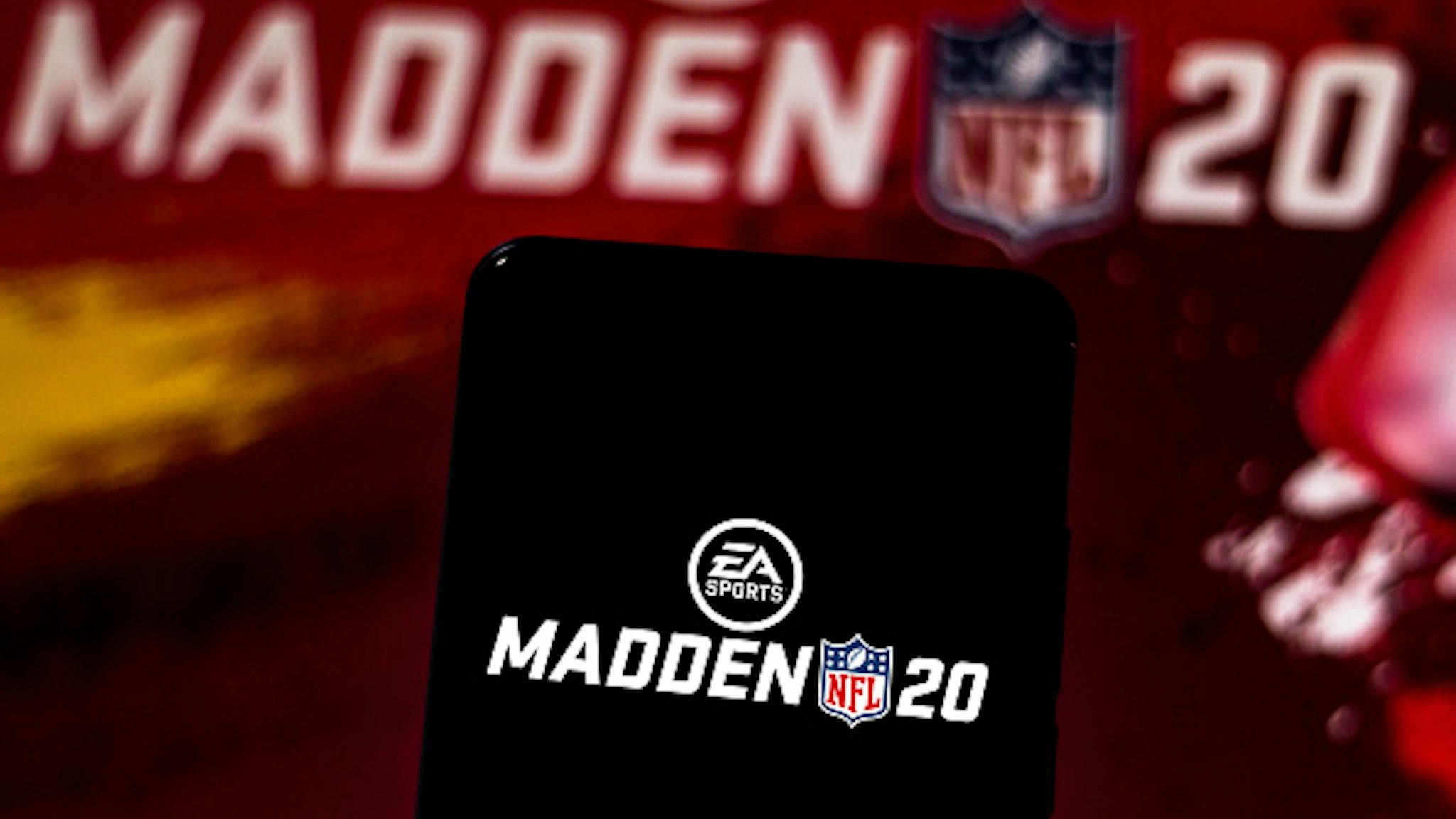 BRAZIL - 2019/06/12: In this photo illustration the Madden NFL 20 logo is displayed on a smartphone.
