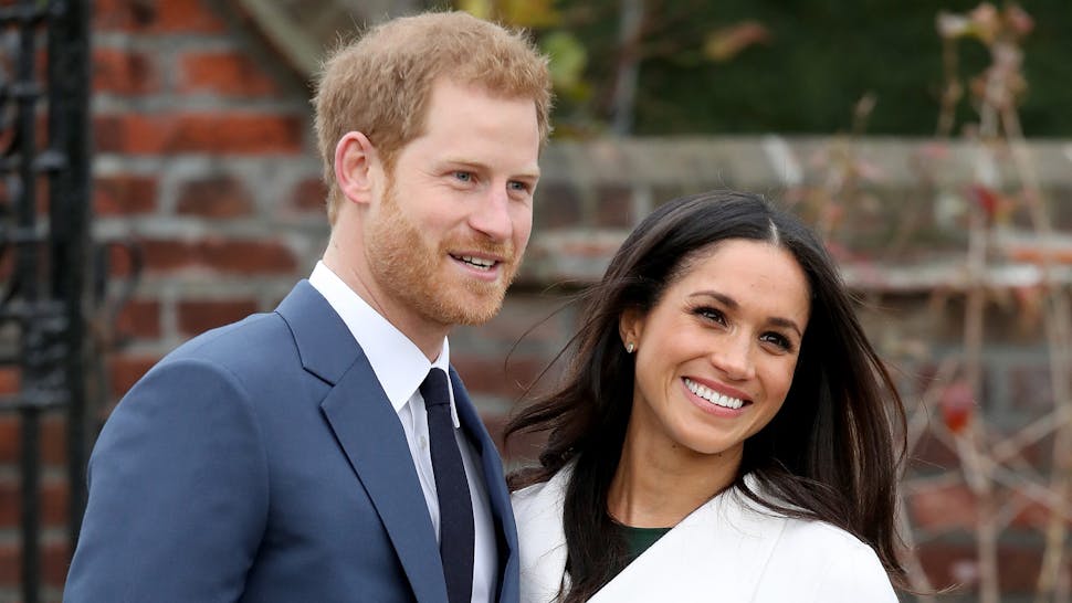 LONDON, ENGLAND - NOVEMBER 27: Prince Harry and actress Meghan Markle during an official photocall to announce their engagement at The Sunken Gardens at Kensington Palace on November 27, 2017 in London, England. Prince Harry and Meghan Markle have been a couple officially since November 2016 and are due to marry in Spring 2018.