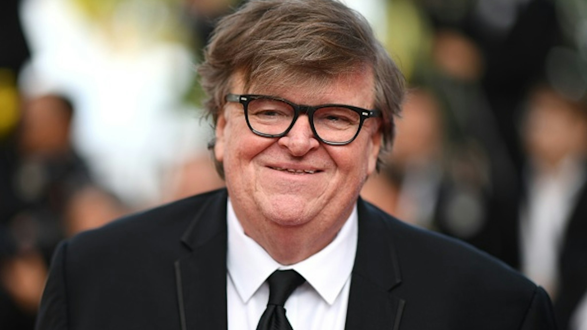 US filmmaker Michael Moore arrives for the screening of the film "The Specials (Hors Normes)" at the 72nd edition of the Cannes Film Festival in Cannes, southern France, on May 25, 2019.