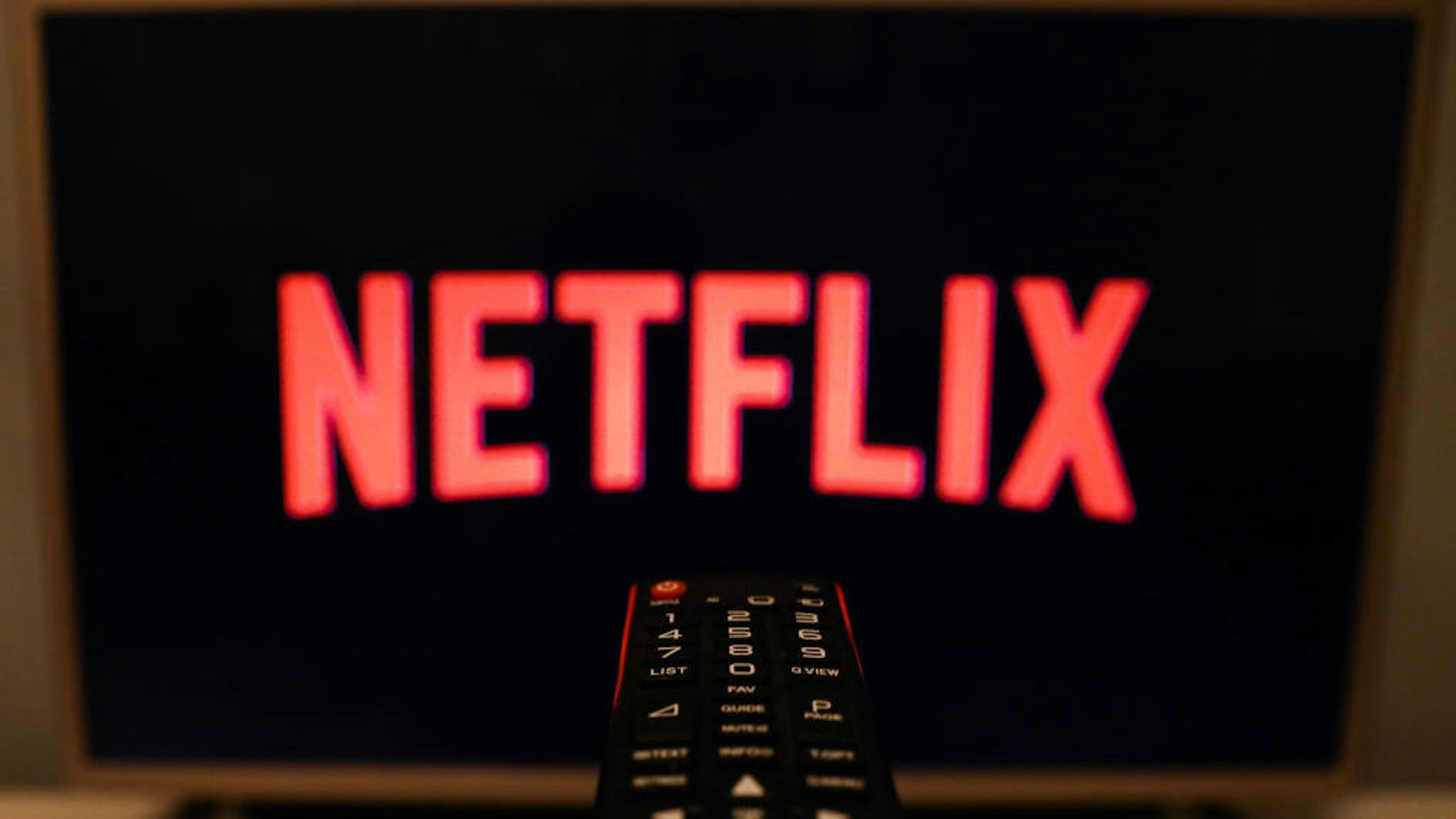 Netflix logo is seen displayed on TV screen in this illustration photo taken in Poland on July 16, 2020. On-Demand streaming services gained popularity and new subscribers during the coronavirus pandemic. (Photo Illustration by Jakub Porzycki/NurPhoto via Getty Images)