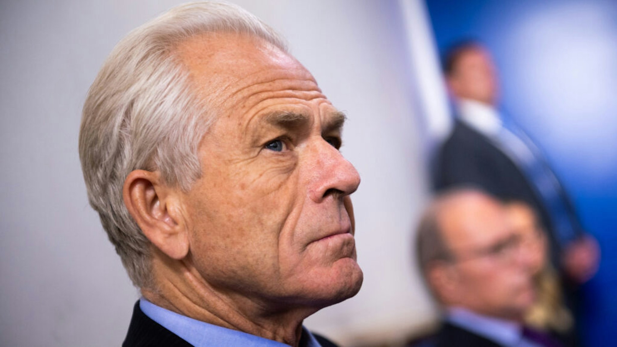 Peter Navarro, director of the National Trade Council, listens as U.S. President Donald Trump, not pictured, speaks during a news conference in the James S. Brady Press Briefing Room at the White House in Washington, D.C., U.S., on Friday, Aug. 14, 2020. Trump announced a collaboration with McKesson Corp. to aid in vaccine distribution.