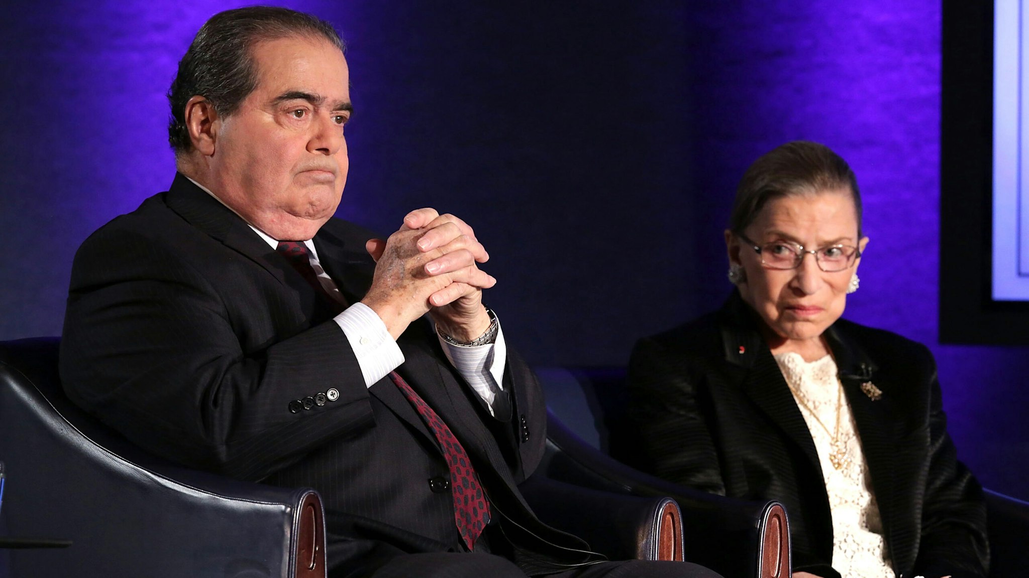 WASHINGTON, DC - APRIL 17: Supreme Court Justices Antonin Scalia (L) and Ruth Bader Ginsburg (R) wait for the beginning of the taping of "The Kalb Report" April 17, 2014 at the National Press Club in Washington, DC. The Kalb Report is a discussion of media ethics and responsibility at the National Press Club held each month.