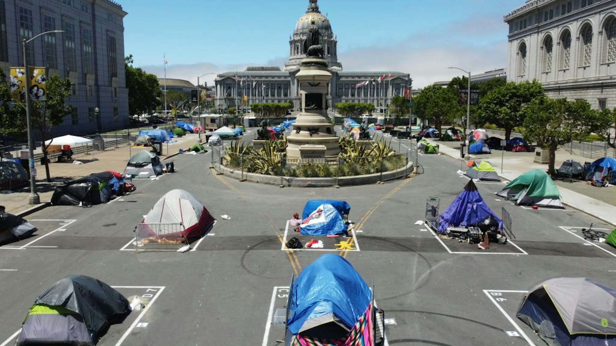 SAN FRANCISCO, CALIFORNIA - MAY 28: Aerial view of painted squares as temporary sanctioned tent encampment for the homeless across from the City Hall amid the coronavirus epidemic on May 28, 2020 in San Francisco, California.