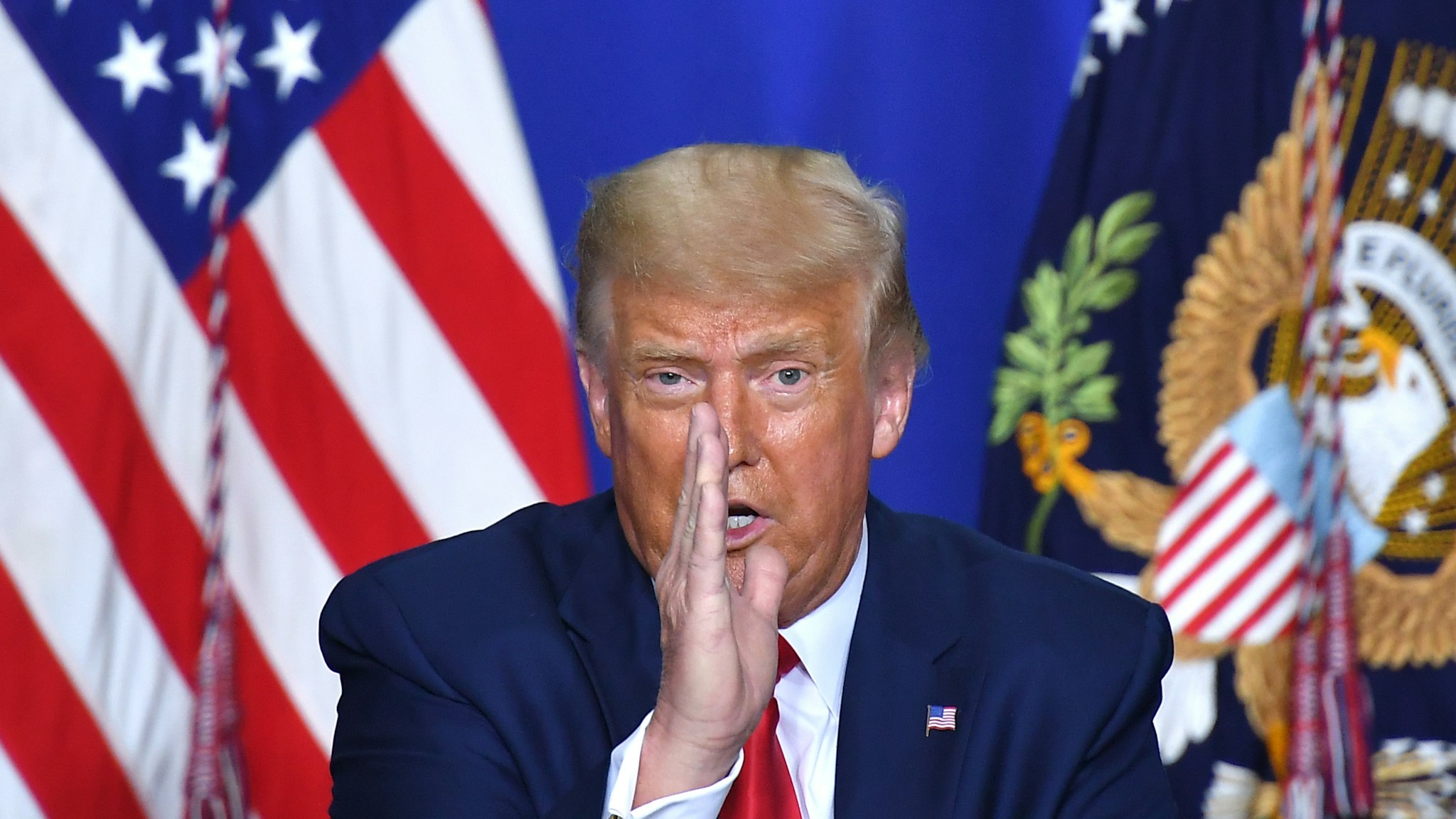 TOPSHOT - US President Donald Trump speaks to officials during a roundtable discussion on community safety, at Mary D. Bradford High School in in Kenosha, Wisconsin on September 1, 2020. - Trump in Kenosha says violent anti-police protests were 'domestic terror.'