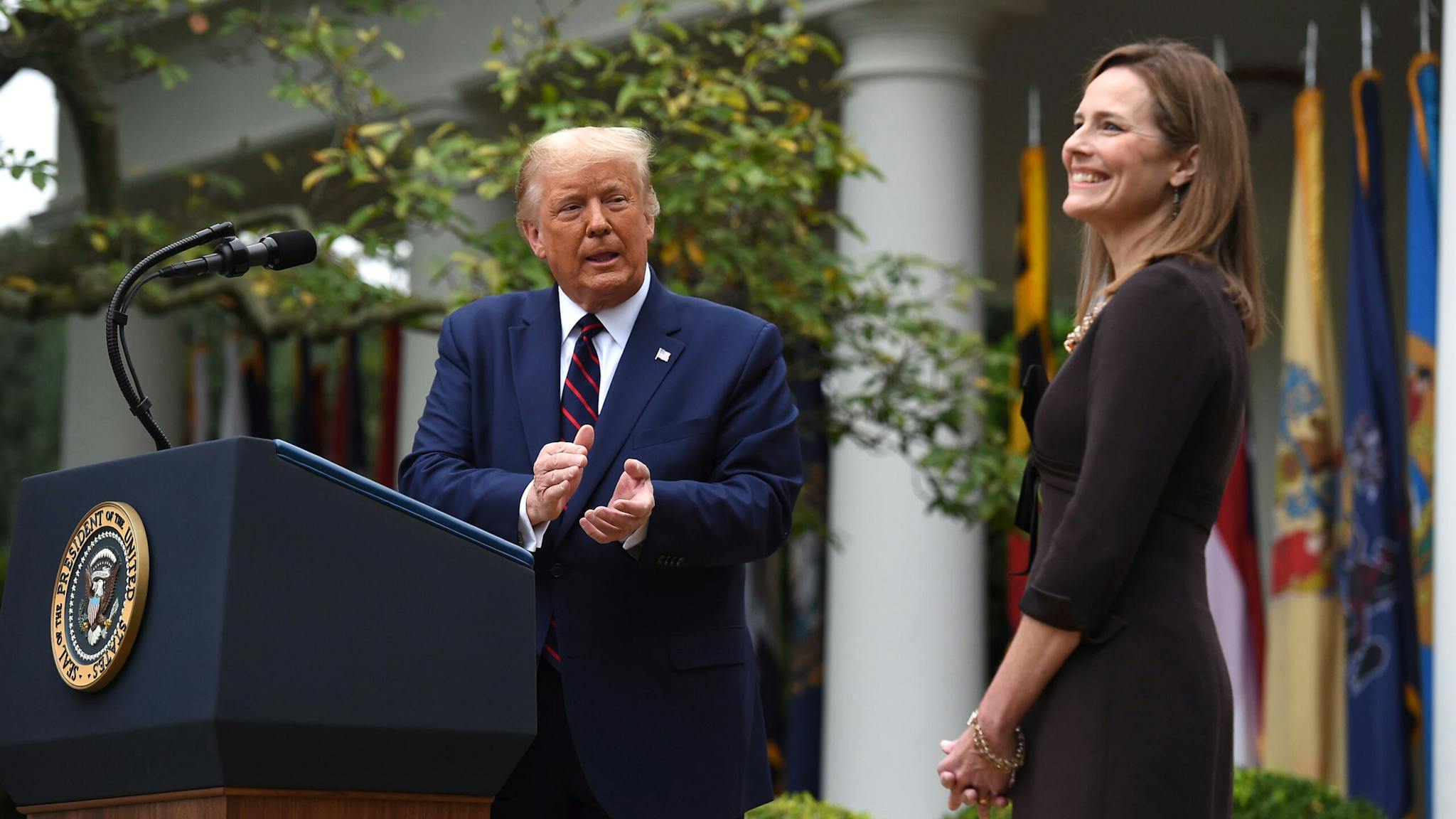 US-VOTE-COURT-TRUMP-BARRETT US President Donald Trump announces his US Supreme Court nominee, Judge Amy Coney Barrett (R), in the Rose Garden of the White House in Washington, DC on September 26, 2020. - Barrett, if confirmed by the US Senate, will replace Justice Ruth Bader Ginsburg, who died on September 18.