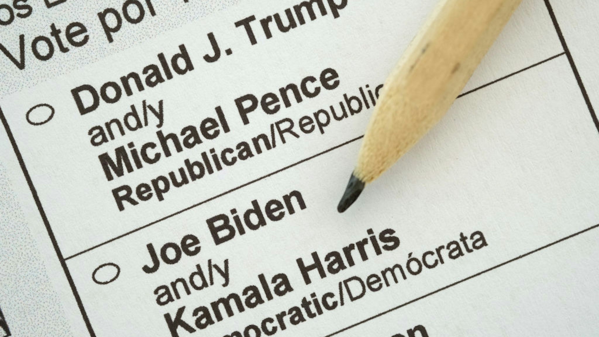In this photo illustration a pencil lies on a U.S. presidential election mail-in ballot received by a U.S. citizen living abroad that shows current U.S. Republican President Donald Trump and his main contender, Democratic presidential candidate Joe Biden, among the choices on September 21, 2020 in Berlin, Germany. Thousands of U.S. citizens living abroad received their mail-in ballots via e-mail over the weekend. (Photo by Sean Gallup/Getty Images)