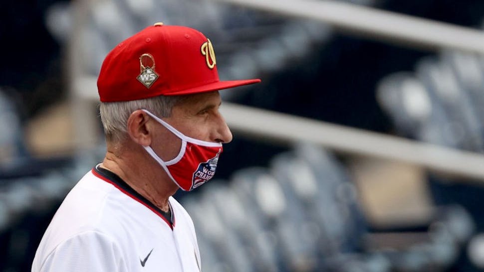 WASHINGTON, DC - JULY 23: Dr. Anthony Fauci, director of the National Institute of Allergy and Infectious Diseases looks on before throwing out the ceremonial first pitch prior to the game between the New York Yankees and the Washington Nationals at Nationals Park on July 23, 2020 in Washington, DC. Photo by