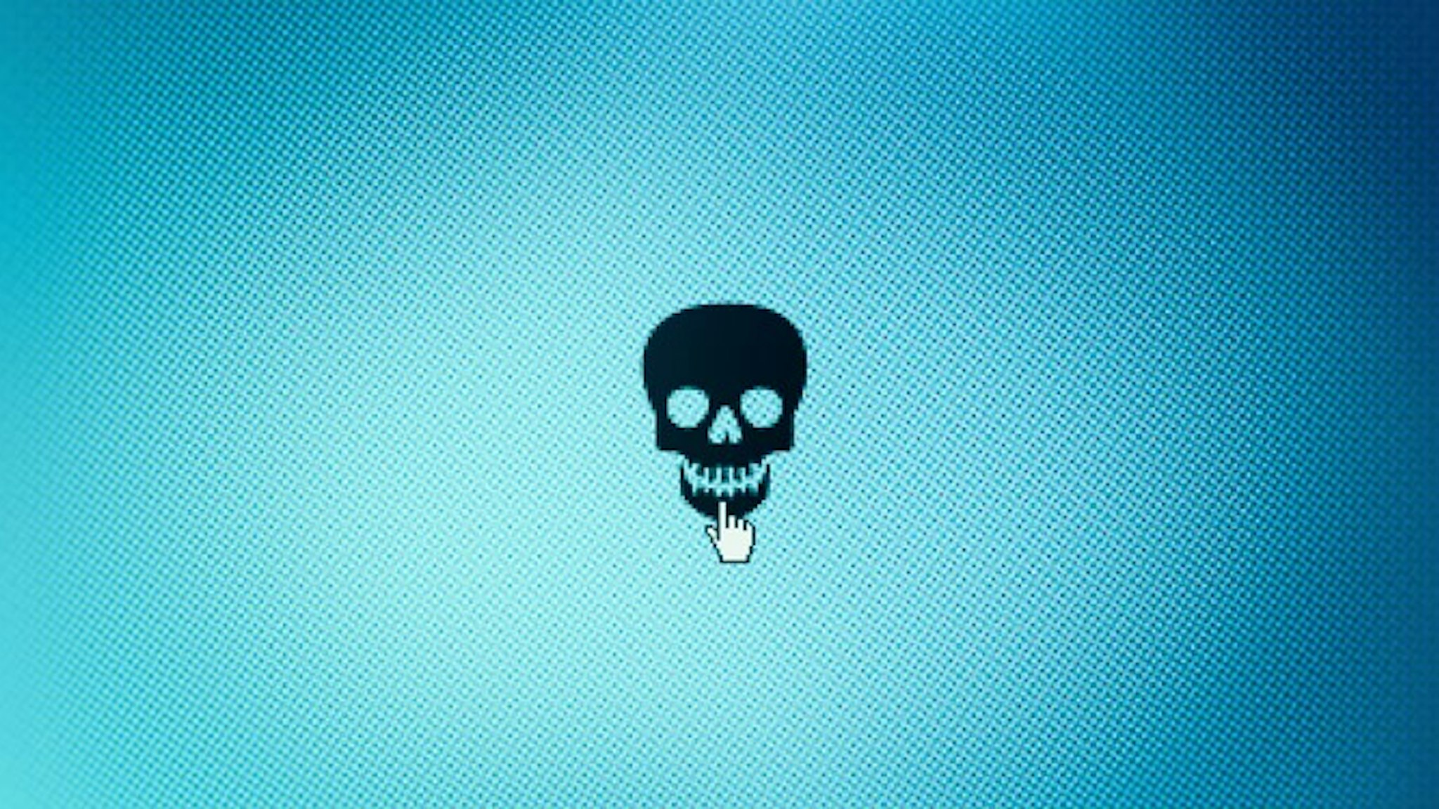 Hacker -- cyber attack -- Close up of skull icon on monitor screen