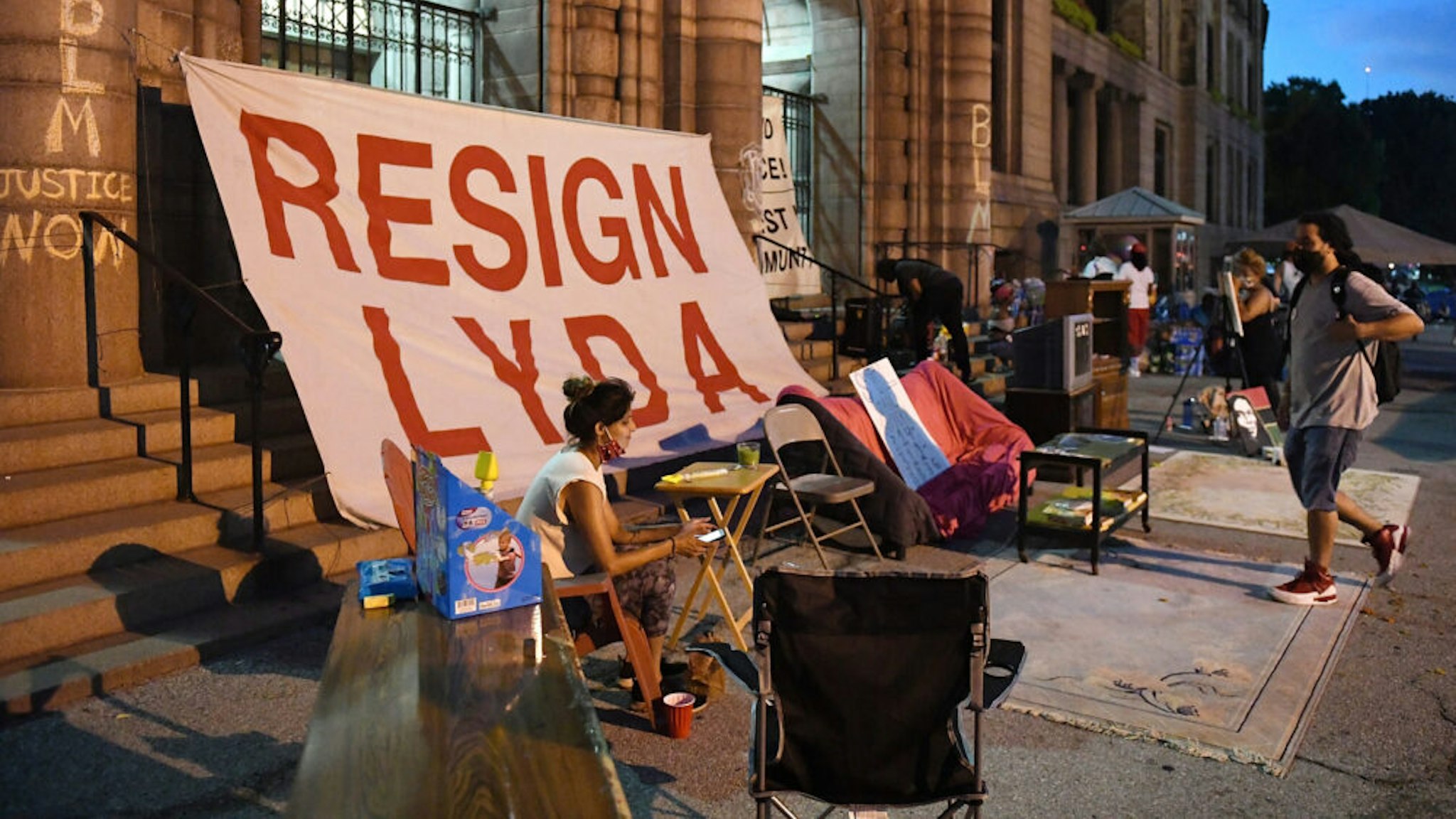 ST LOUIS, MO - JULY 09: Protesters occupy outside St. Louis City Hall on July 9, 2020 in St Louis, Missouri. Many Protesters are demanding the resignation of St. Louis City Mayor Lyda Krewson after she revealed names and addresses of Protesters calling for police reform.