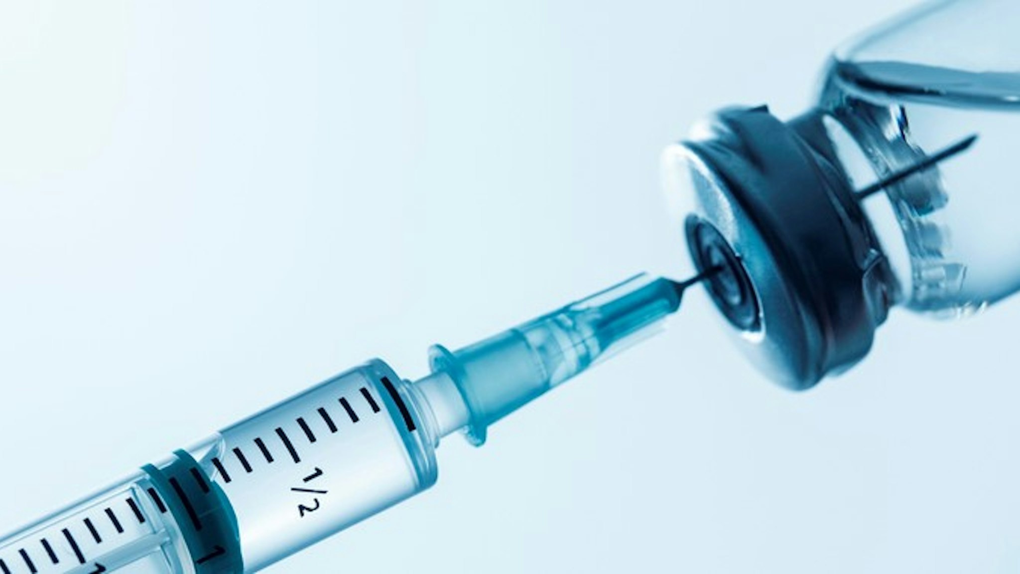 Syringe being filled