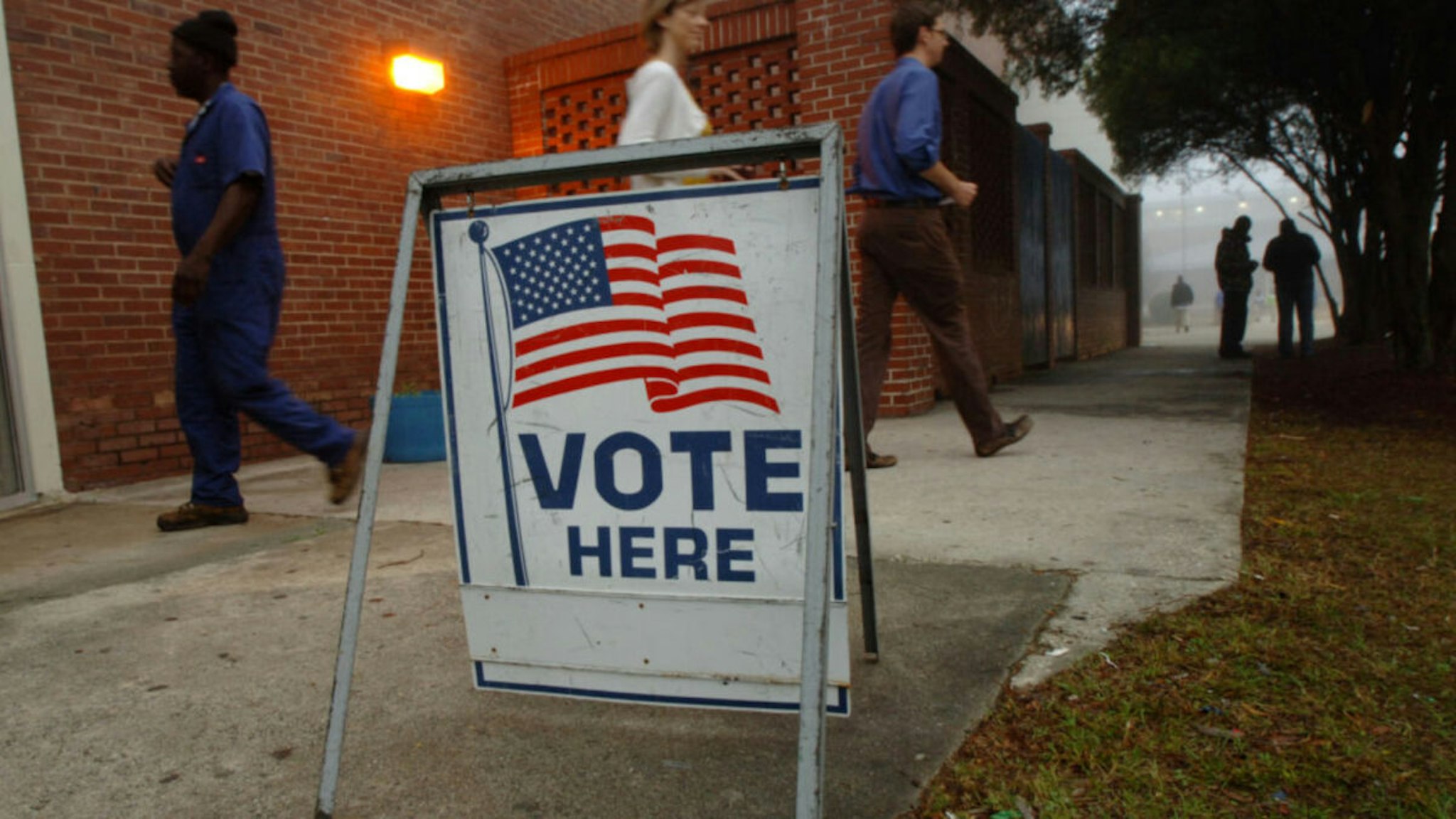 Voters leave a precinct after casting their ballots during Georgia's primary Super Tuesday's presidential election January 5, 2008 in Savannah, Georgia.